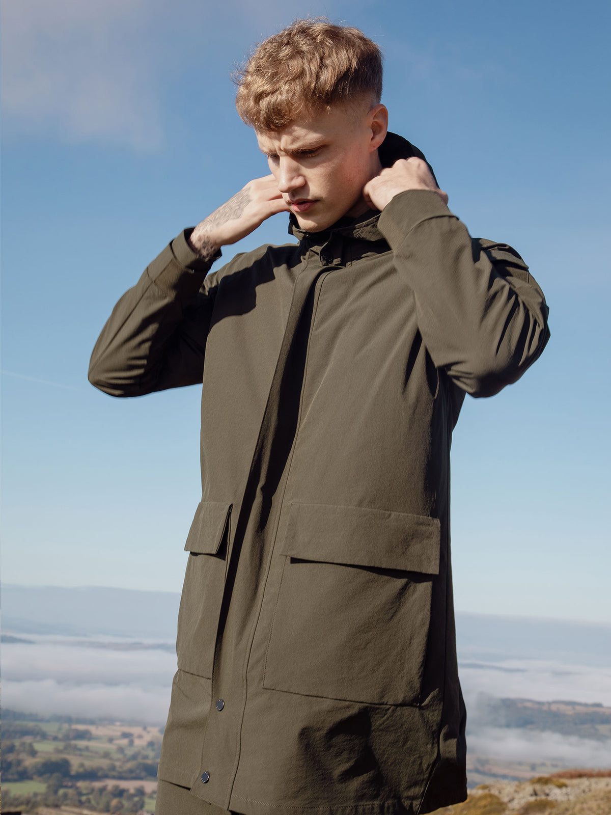 Men's green jacket with zip-up front.