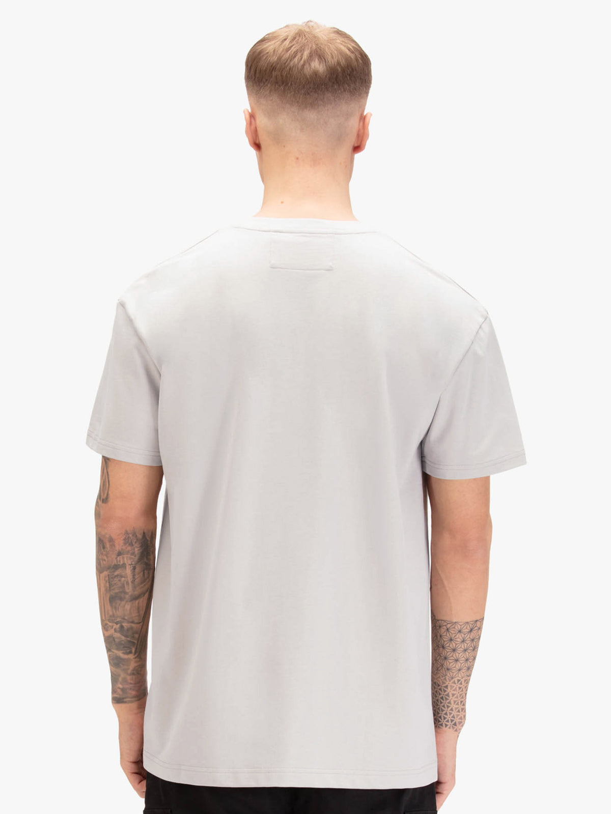 Men's relaxed-fit grey t-shirt with crew neck and short sleeves, worn by a model, back view