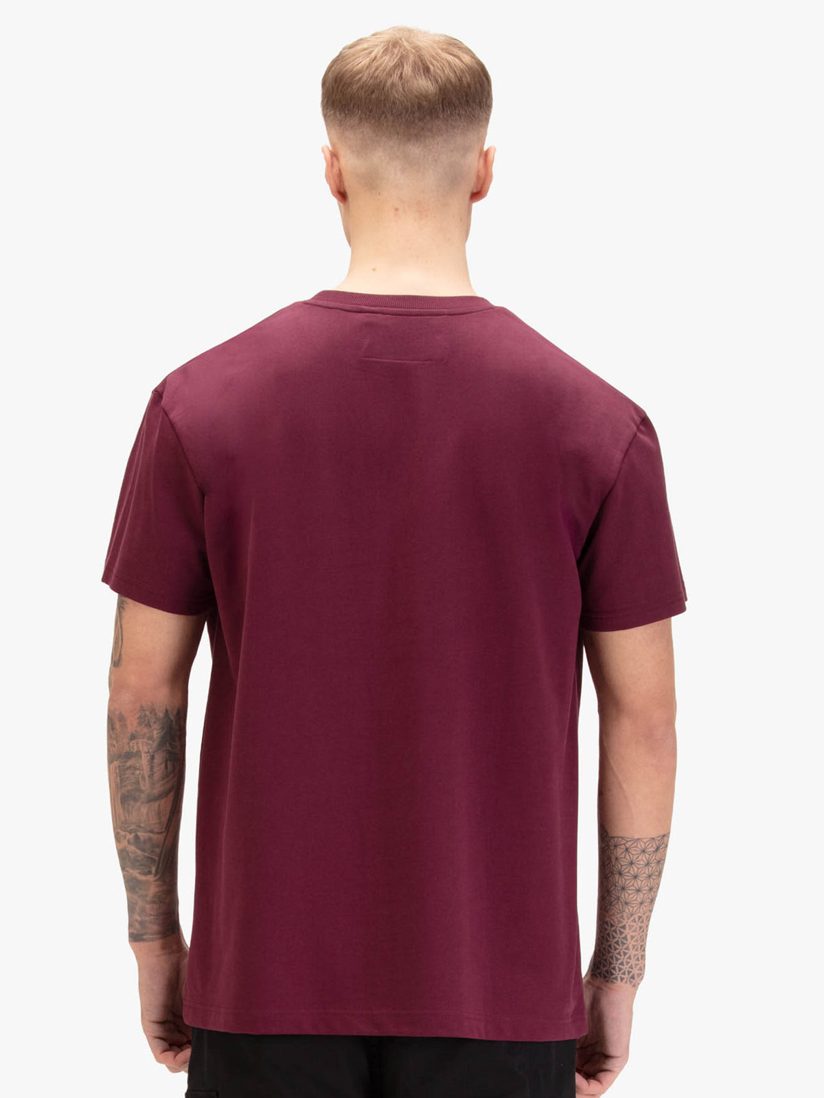 Men's relaxed-fit red t-shirt with crew neck and short sleeves, worn by a model, back view