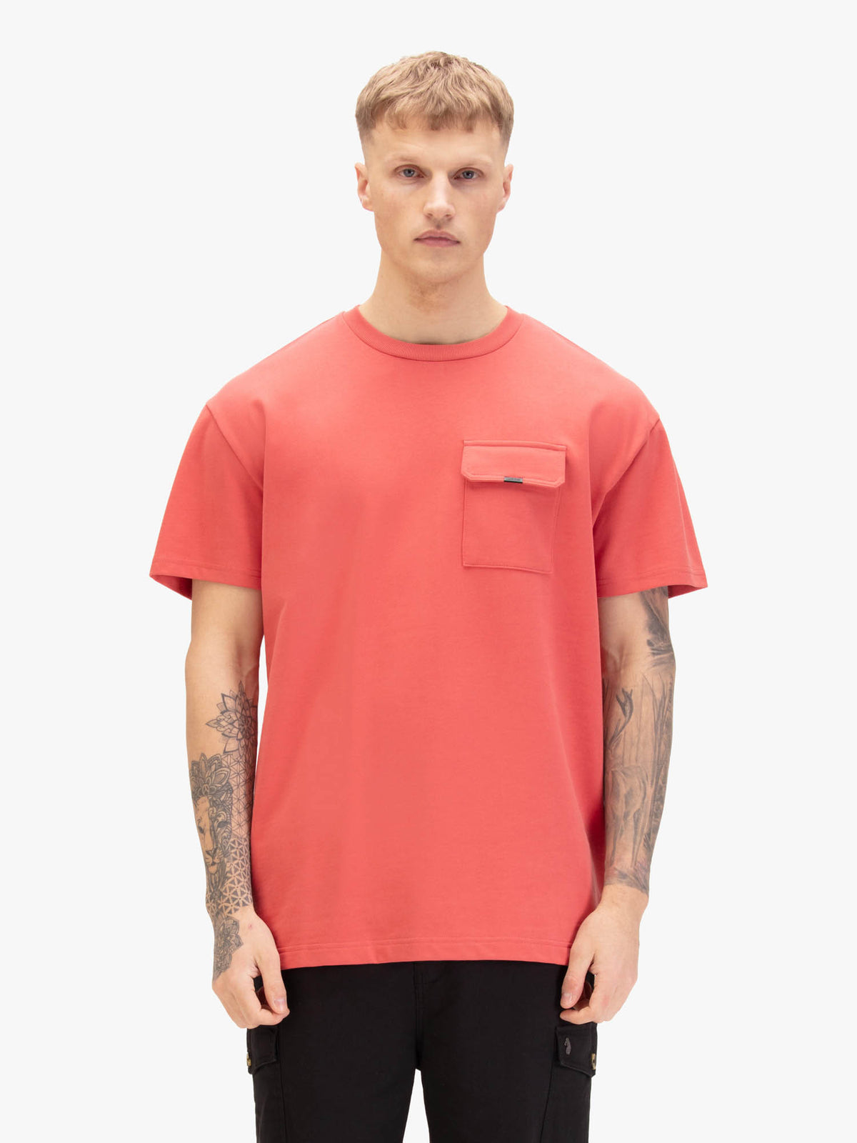 Men's relaxed-fit red t-shirt with crew neck and short sleeves, worn by a model, front view