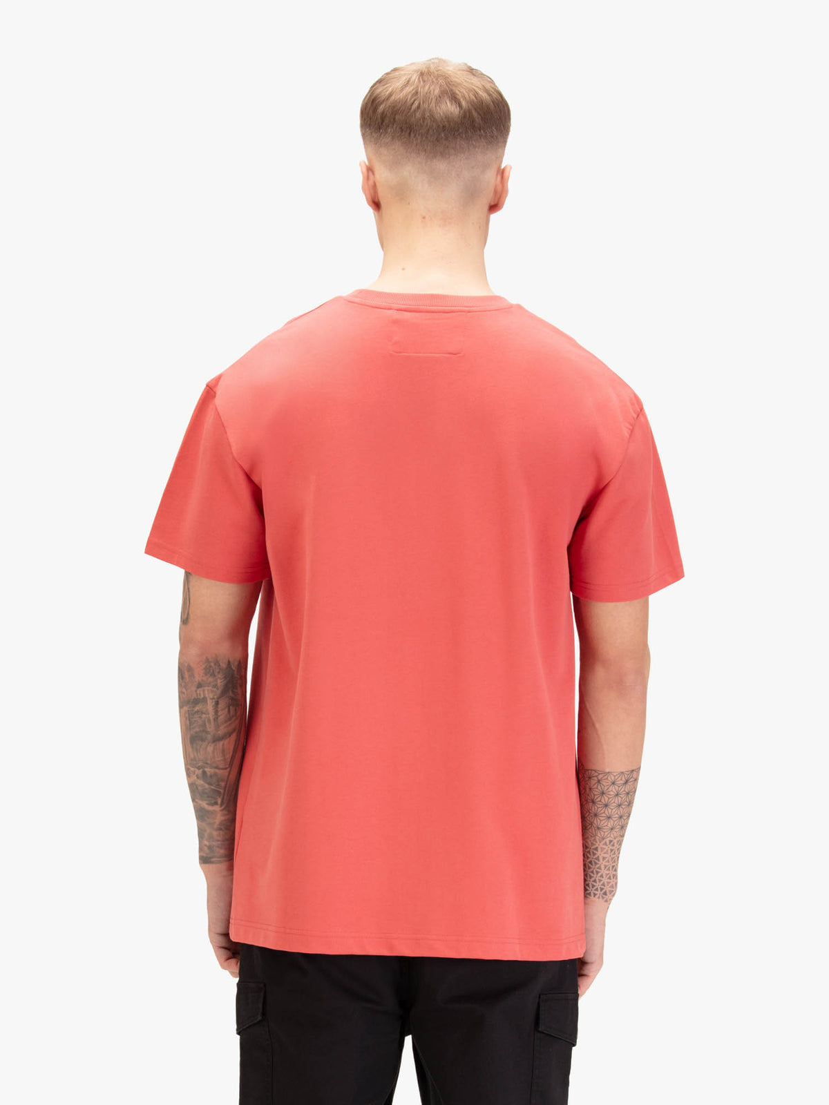 Men's relaxed-fit red t-shirt with crew neck and short sleeves, worn by a model, back view