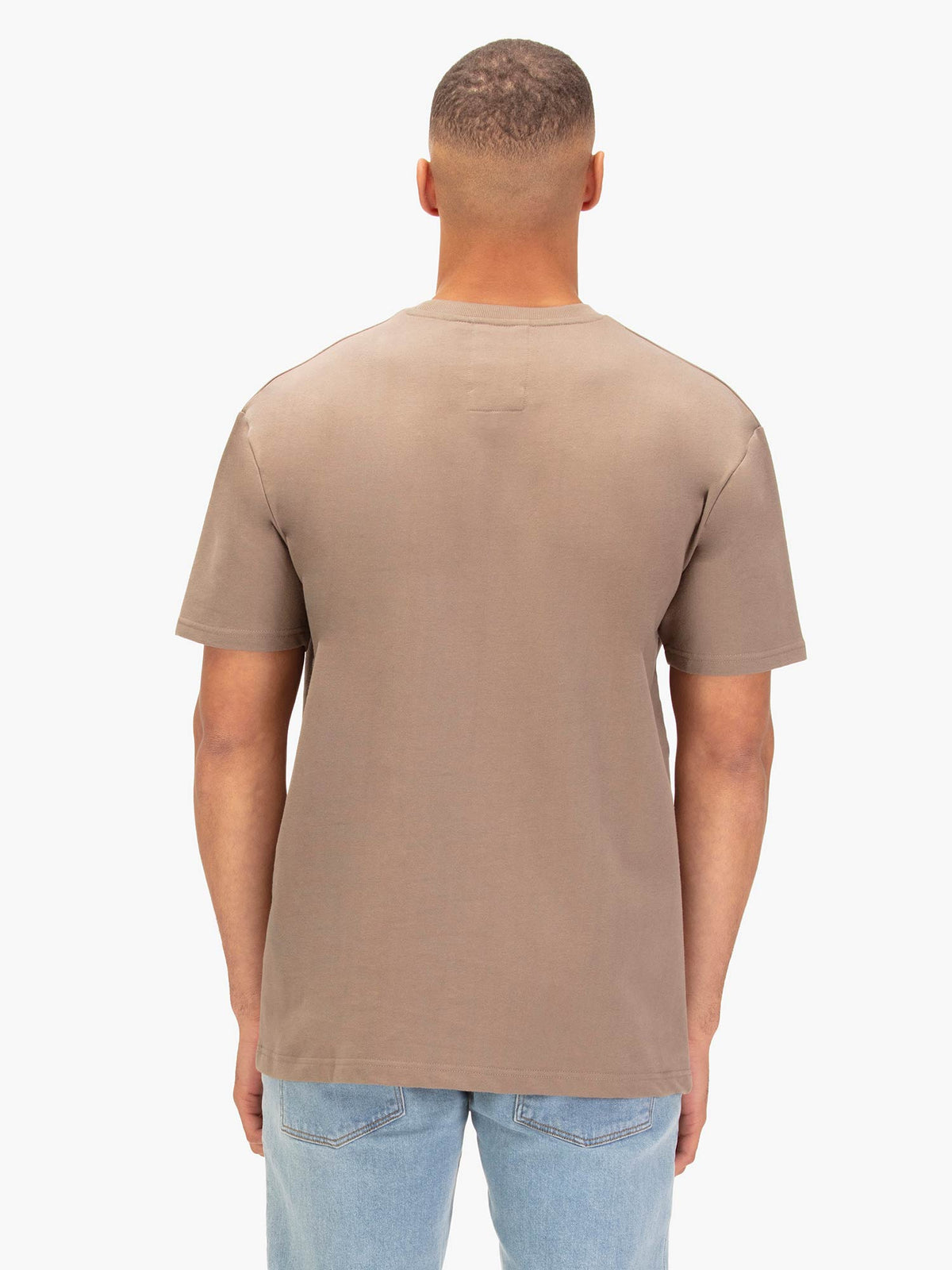 Back view of Hard Nut brown LUKE 1977 Dragger t-shirt worn by model