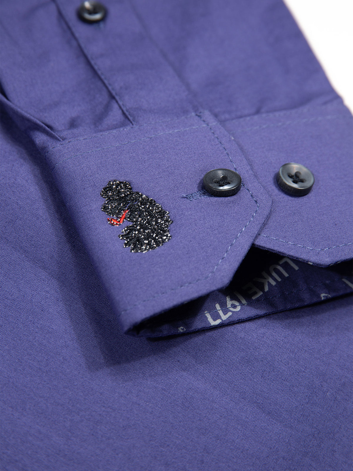 Men's purple shirt with button-up front.