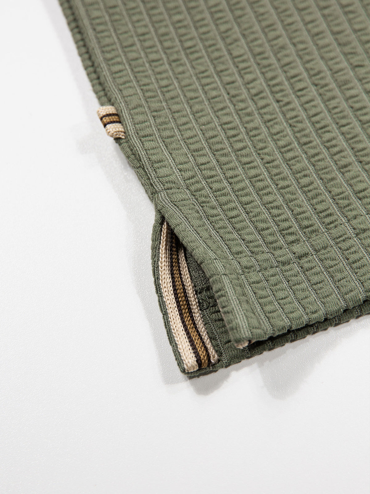 Men's green polo shirt with polo collar.