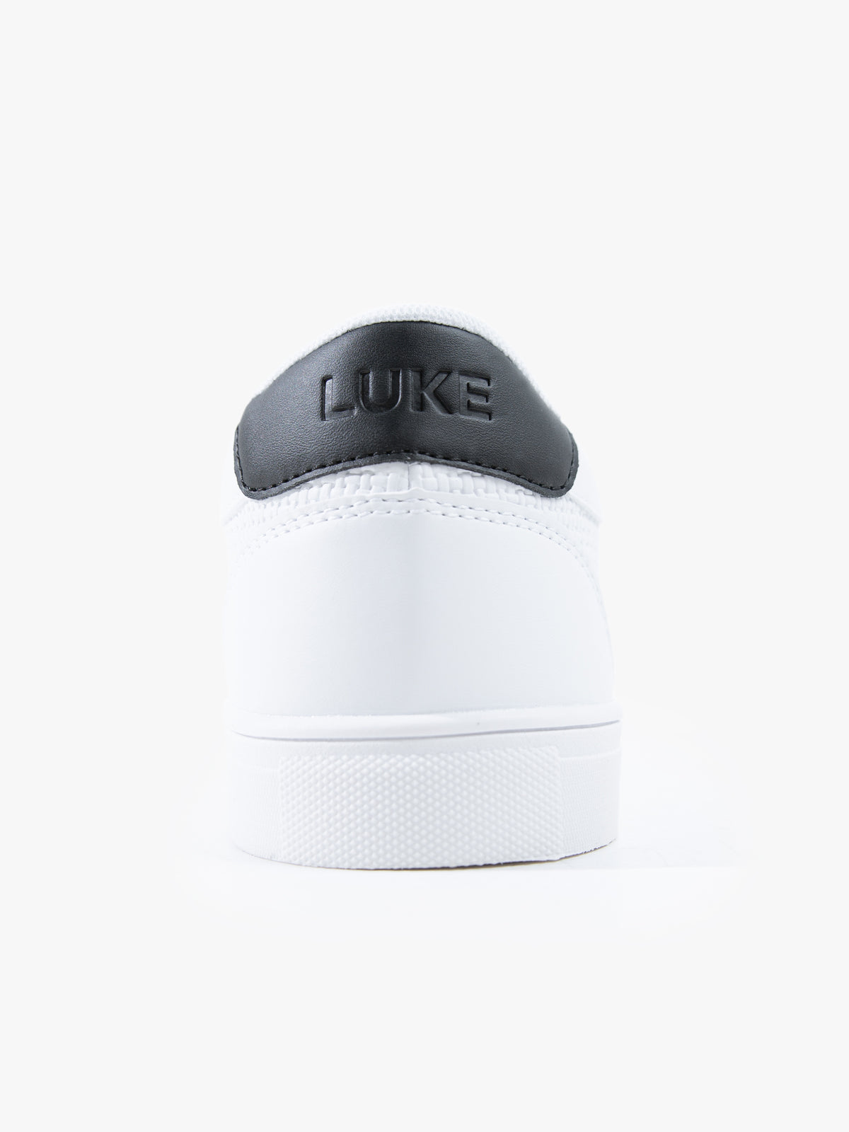 Men's white footwear.