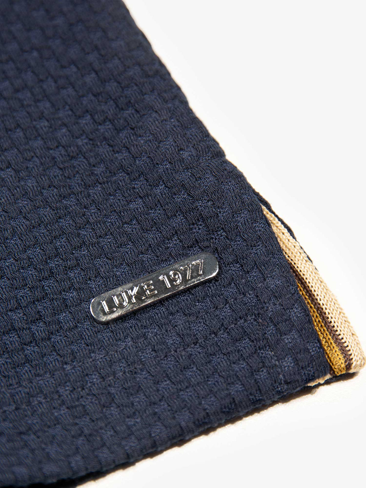 Men's navy polo shirt with polo collar, detail view 2