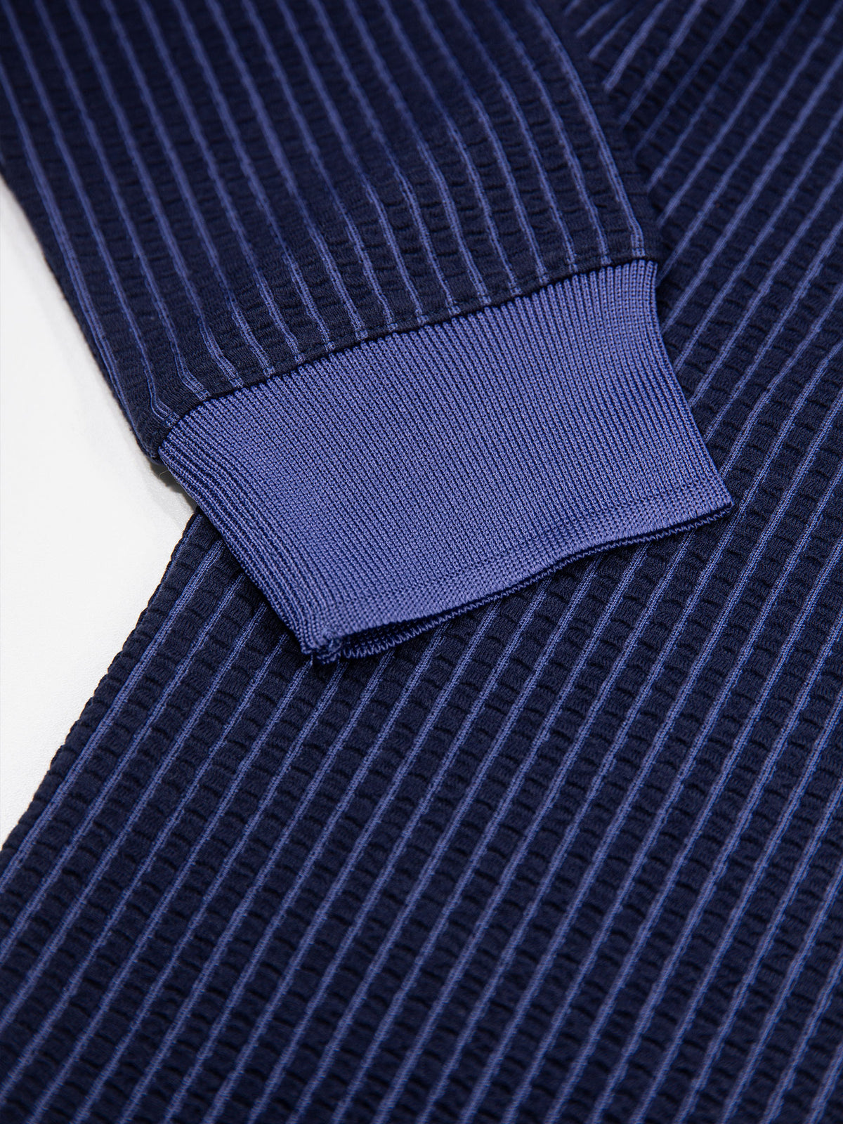 Men's navy polo shirt with polo collar.