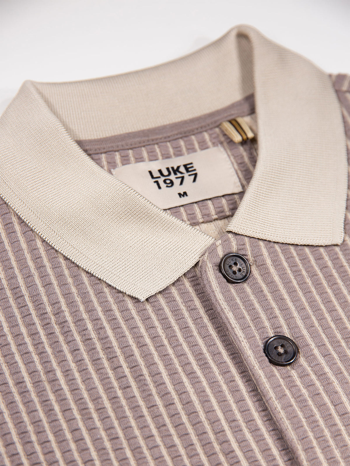 Men's brown polo shirt with polo collar.