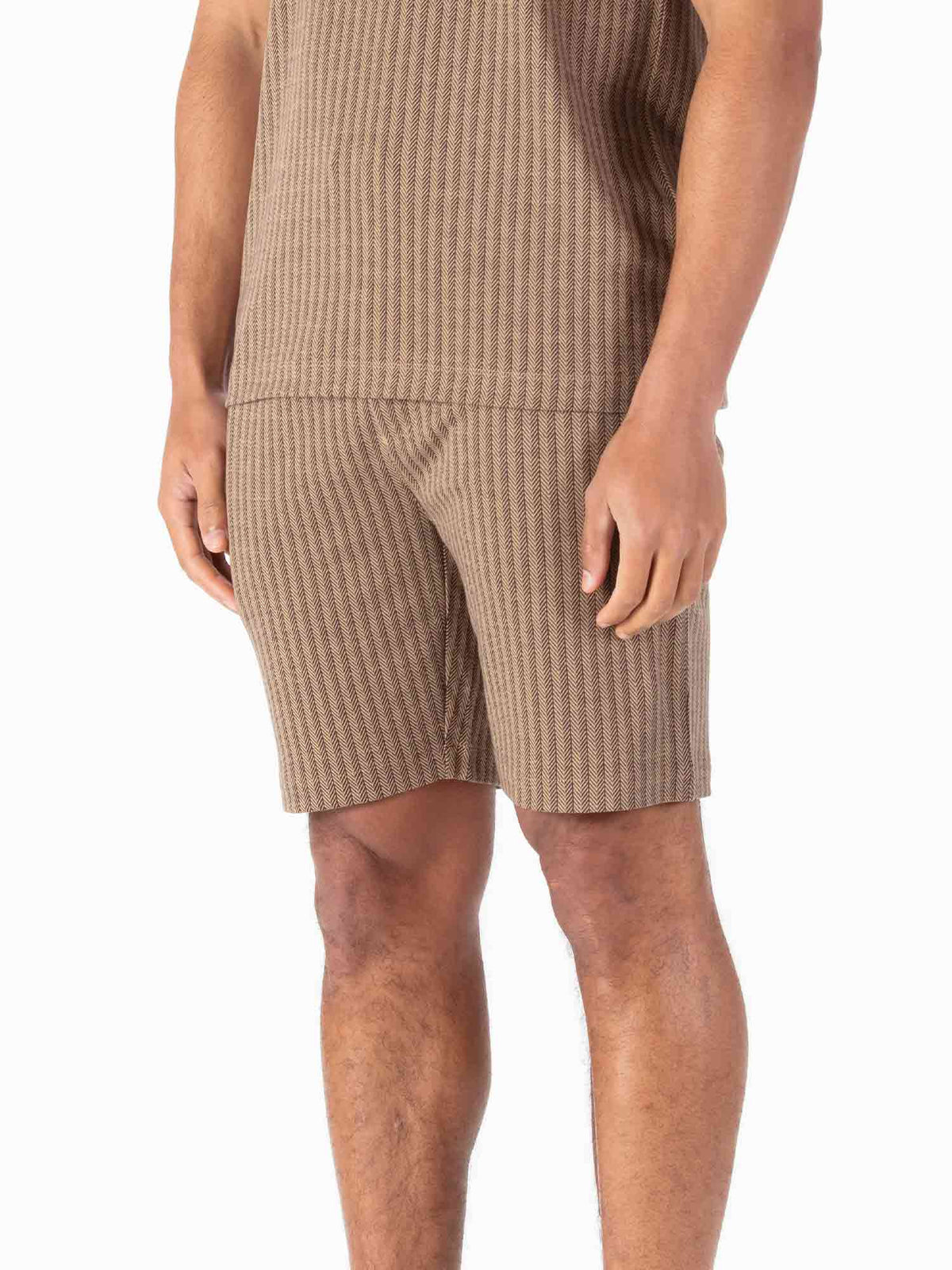 Men's brown shorts with drawstring waistband.