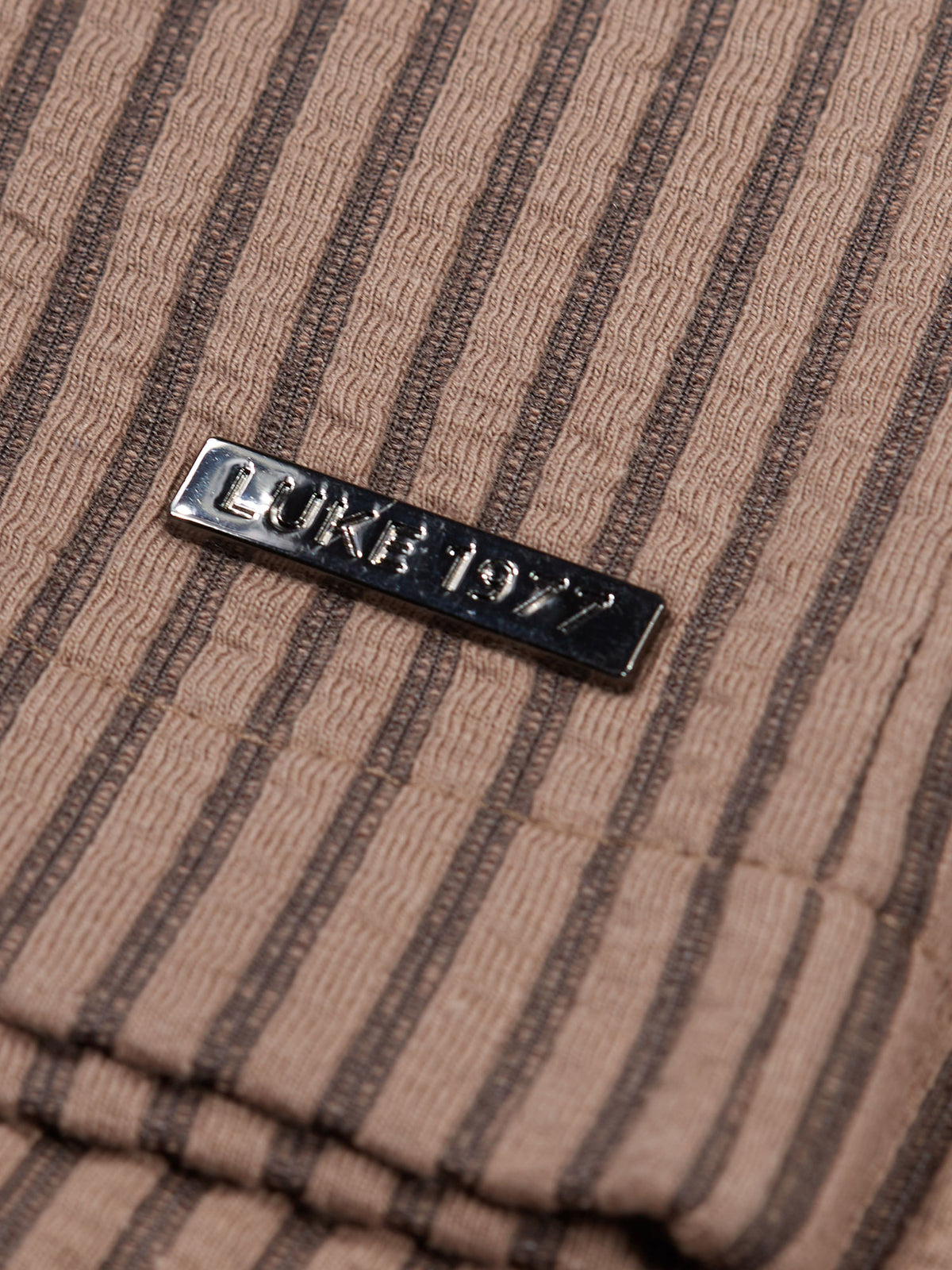 Men's brown shorts with drawstring waistband.