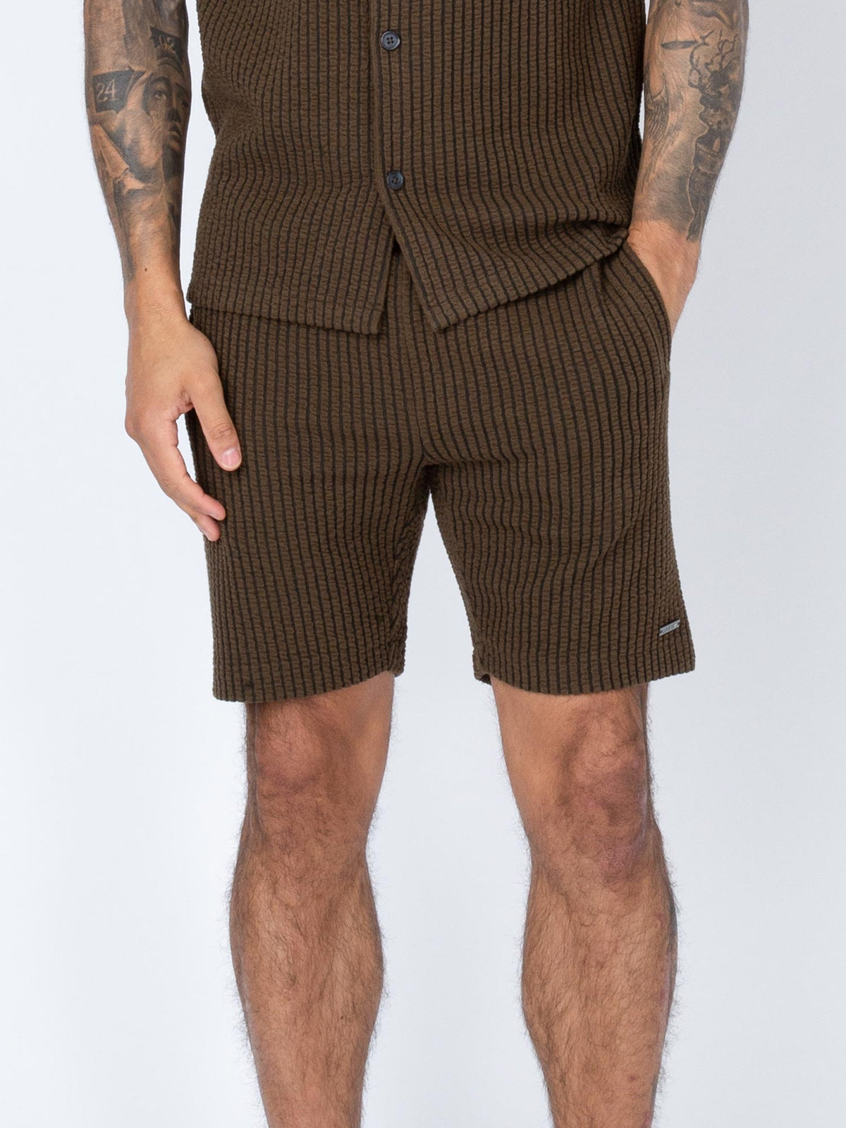 Men's brown shorts with drawstring waistband.
