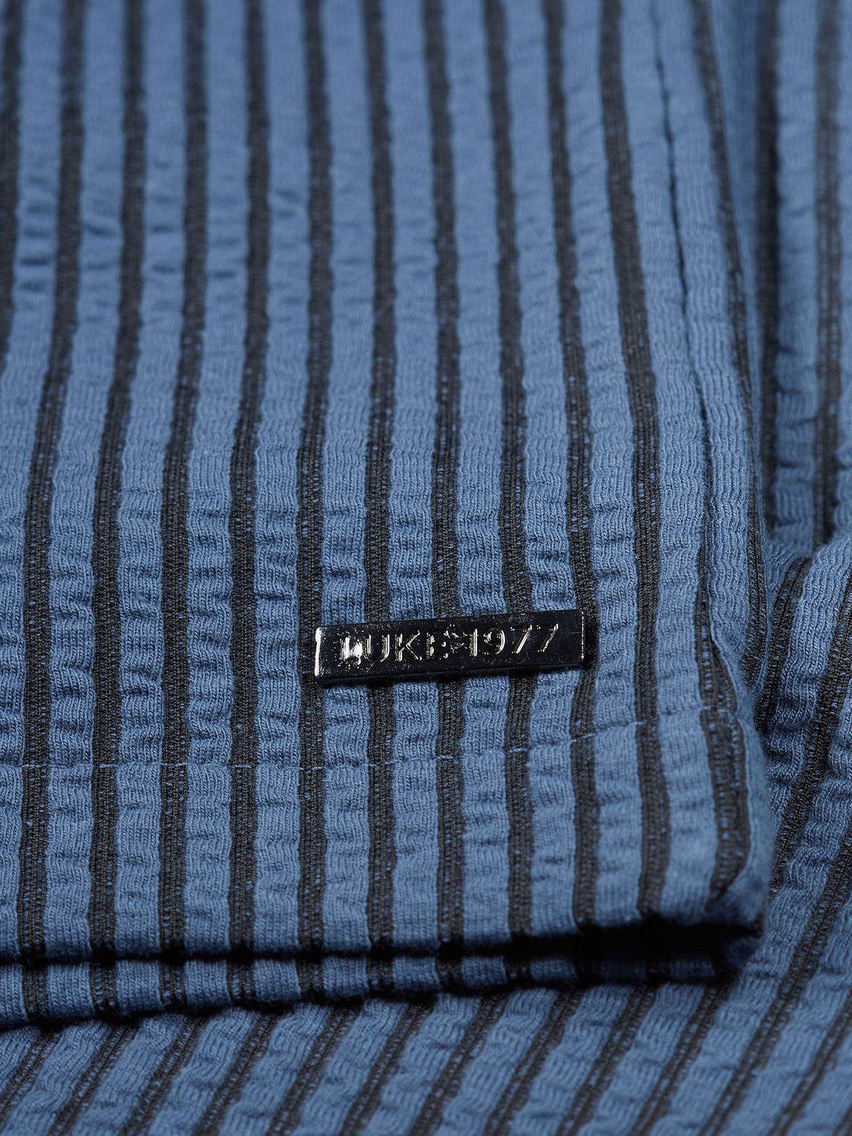 Men's blue shorts with drawstring waistband.
