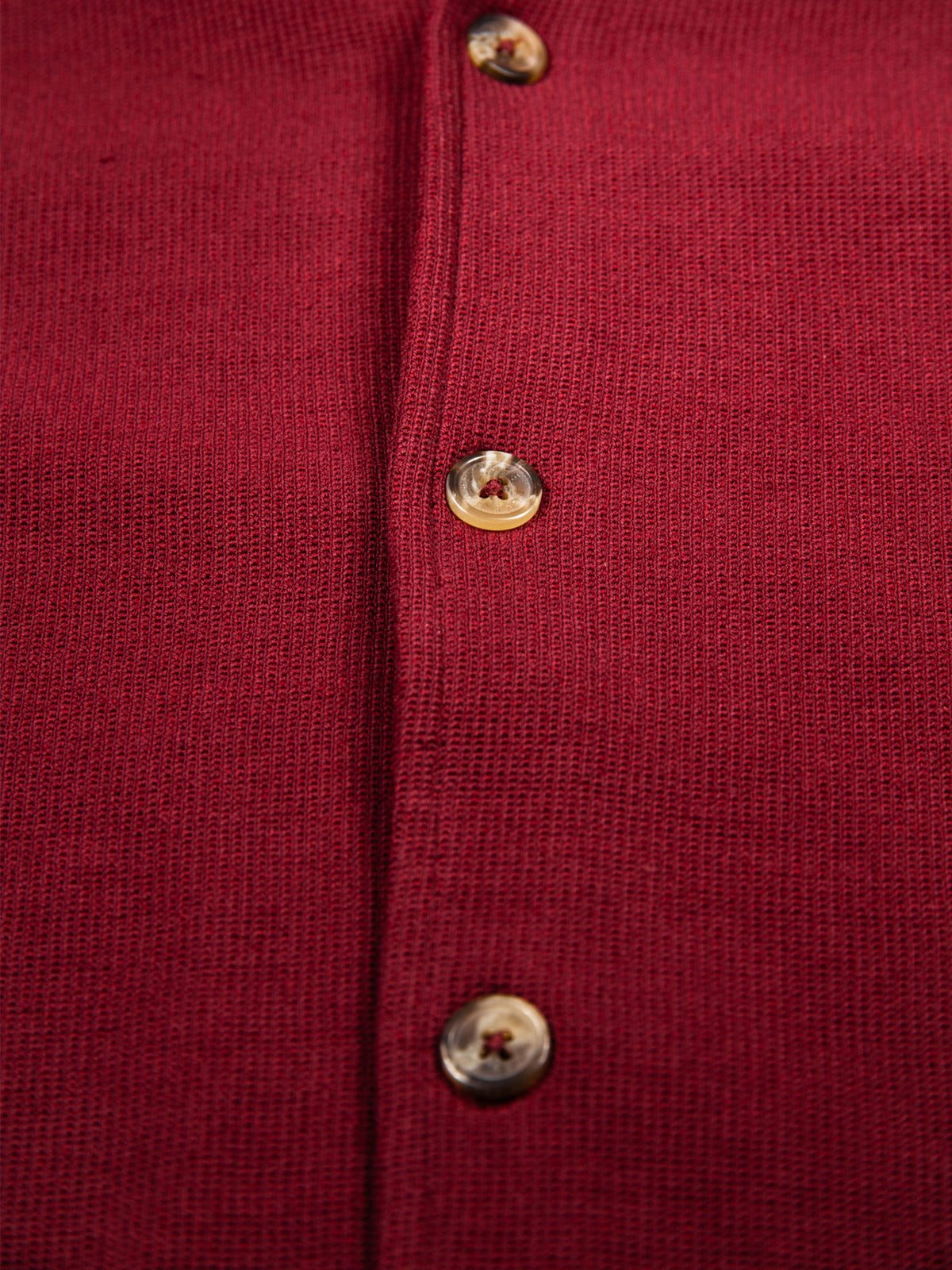 Men's red shirt with button-up front.