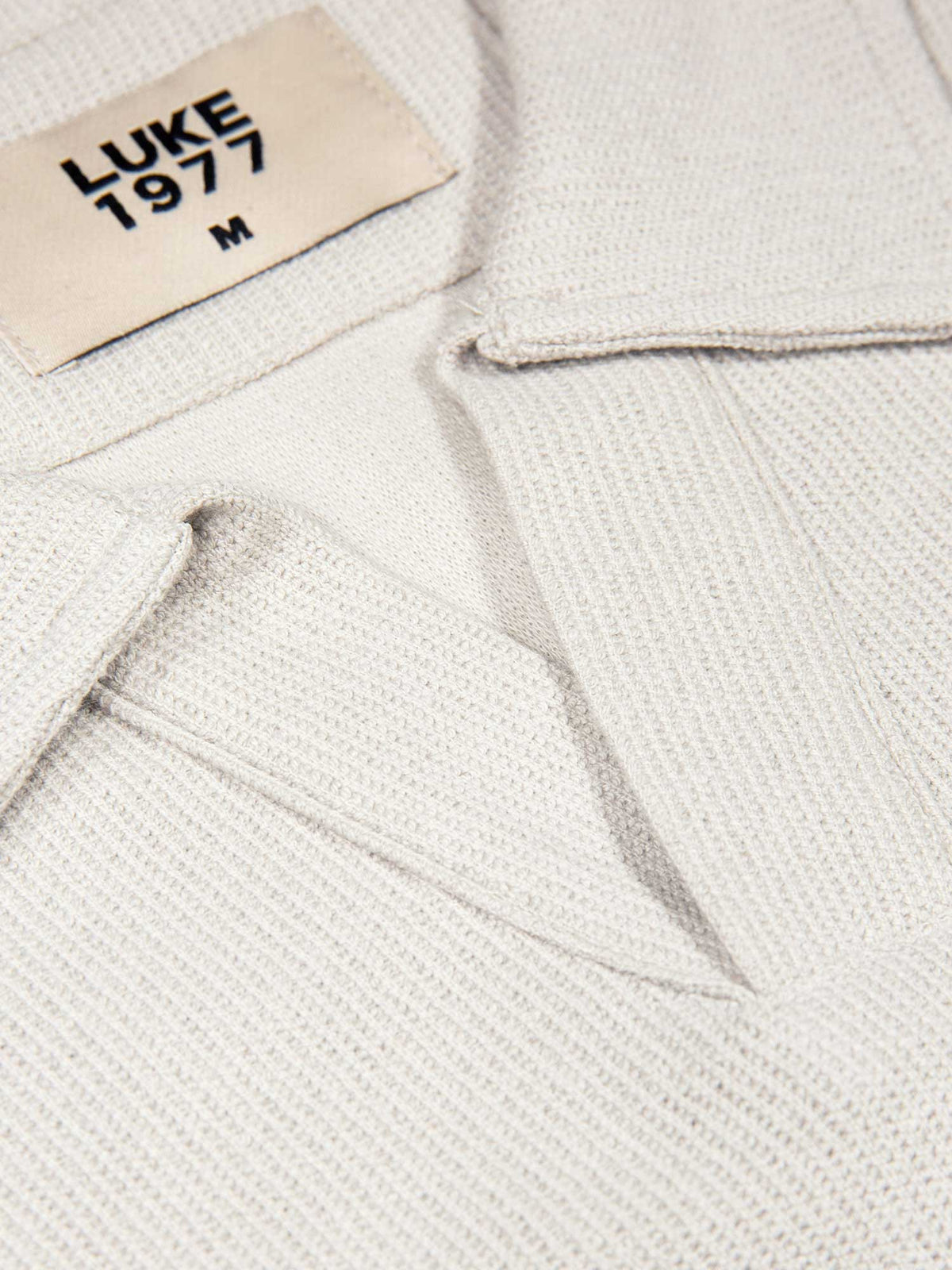 Men's grey polo shirt with polo collar, detail view 2