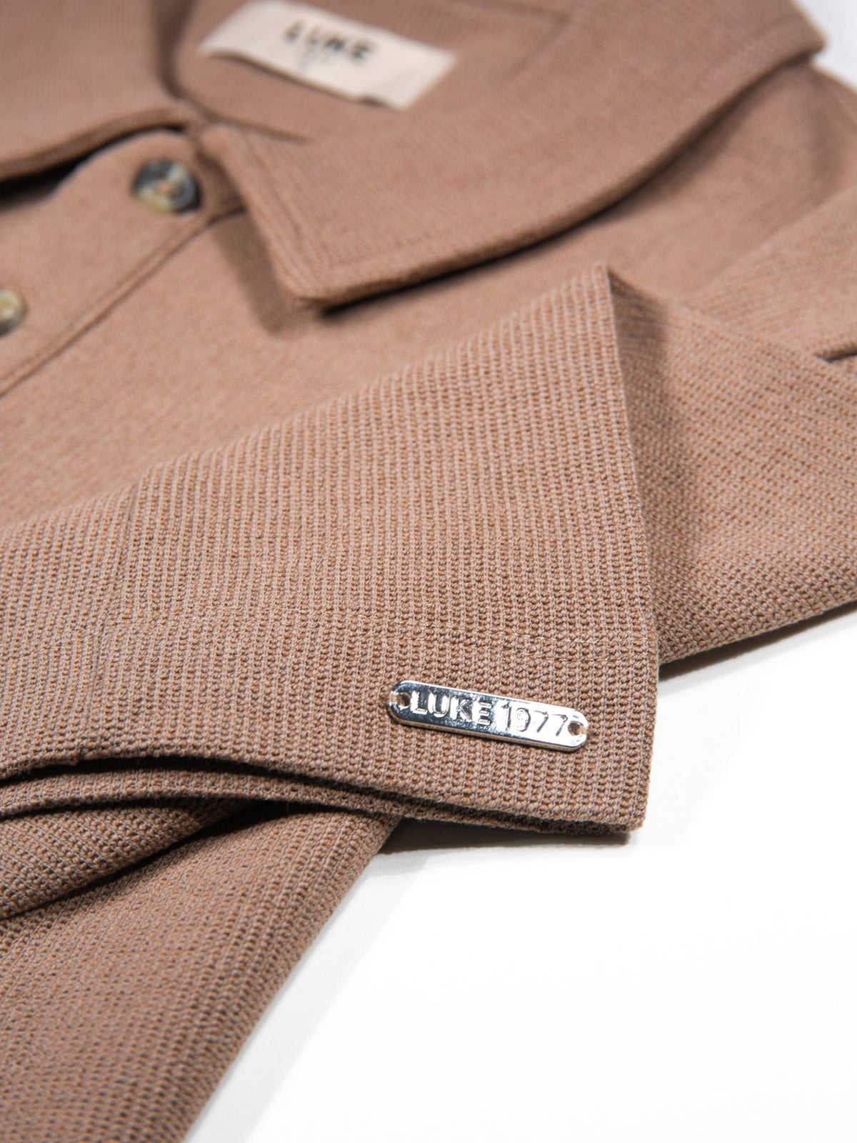 Men's brown polo shirt with polo collar.