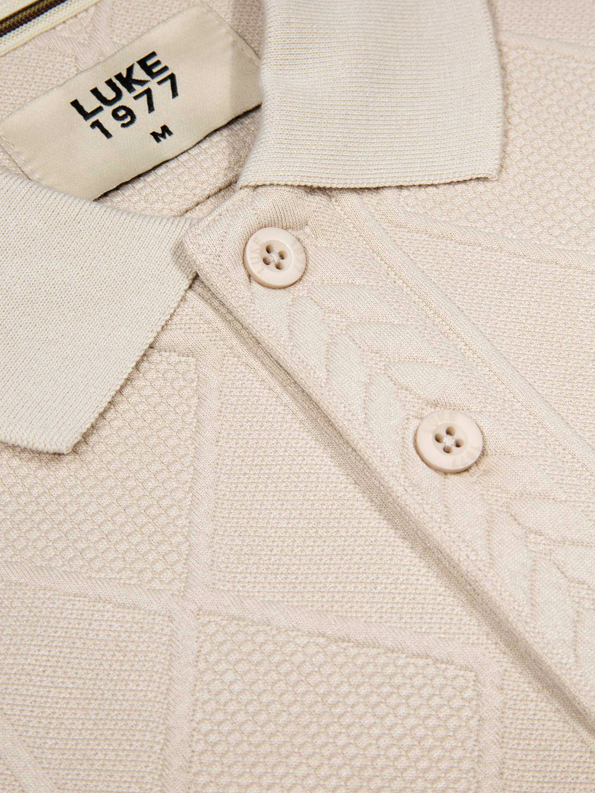 Men's beige polo shirt with polo collar, detail view