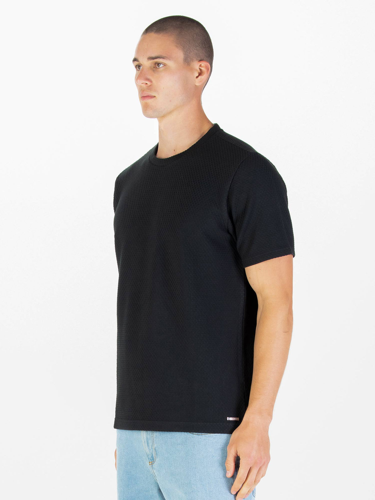 Men's black t-shirt with crew neck and short sleeves.