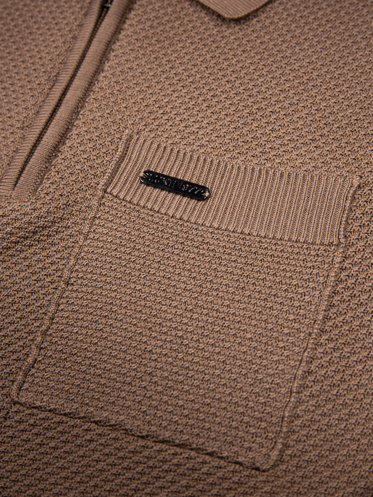 Men's brown knitted polo with polo collar.