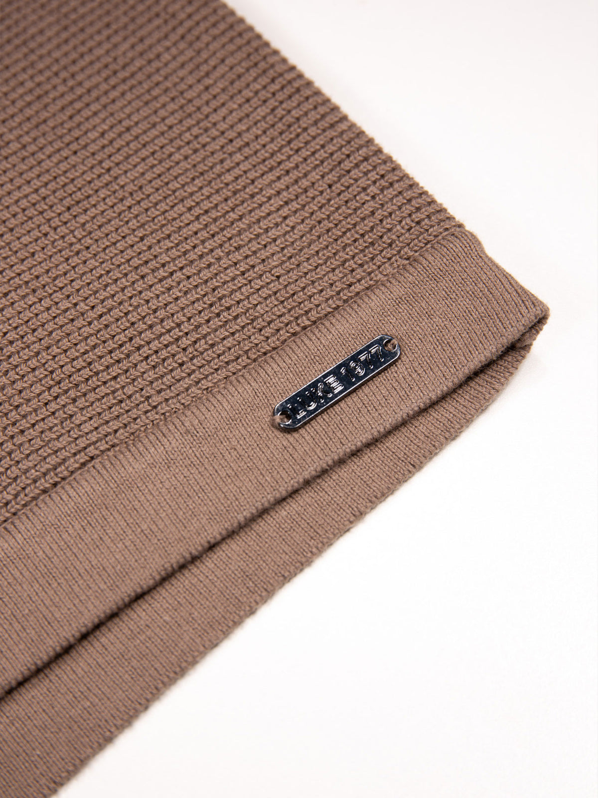 Men's brown knitted polo with polo collar.