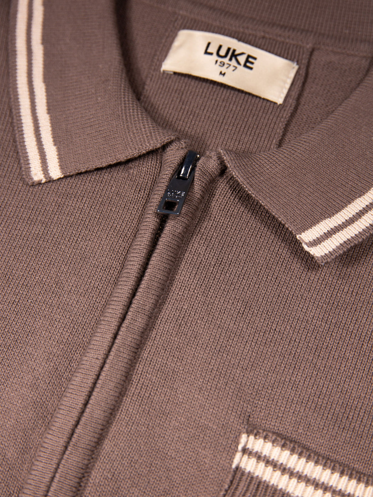 Men's brown knitted polo with polo collar.