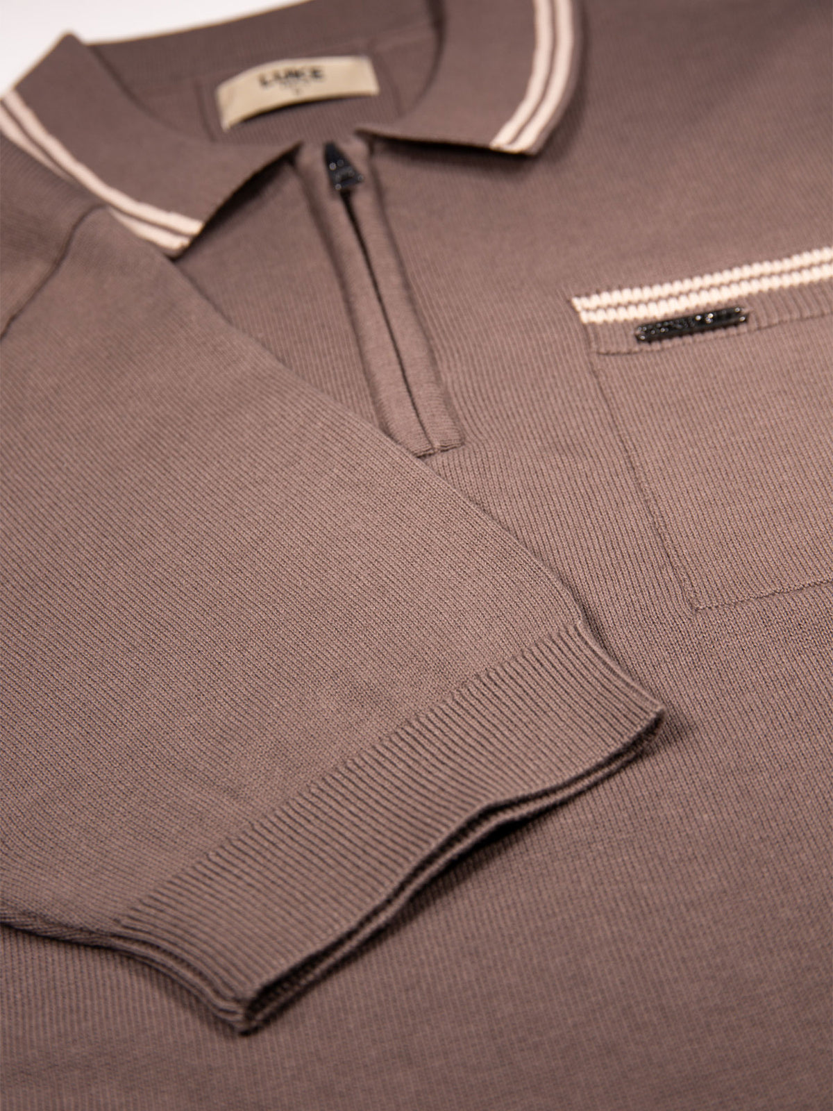 Men's brown knitted polo with polo collar.