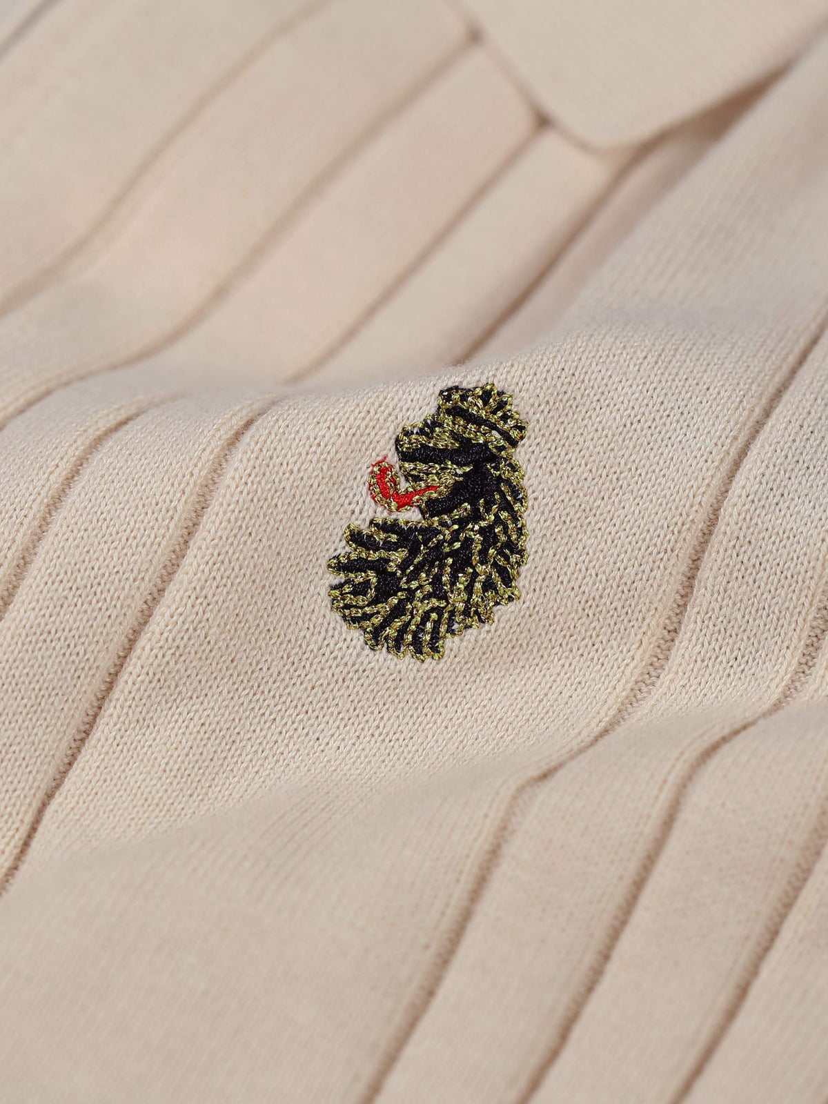 RIB EYE KNITTED ZIP POLO