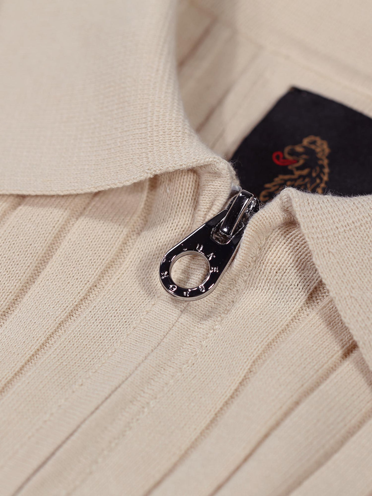 RIB EYE KNITTED ZIP POLO