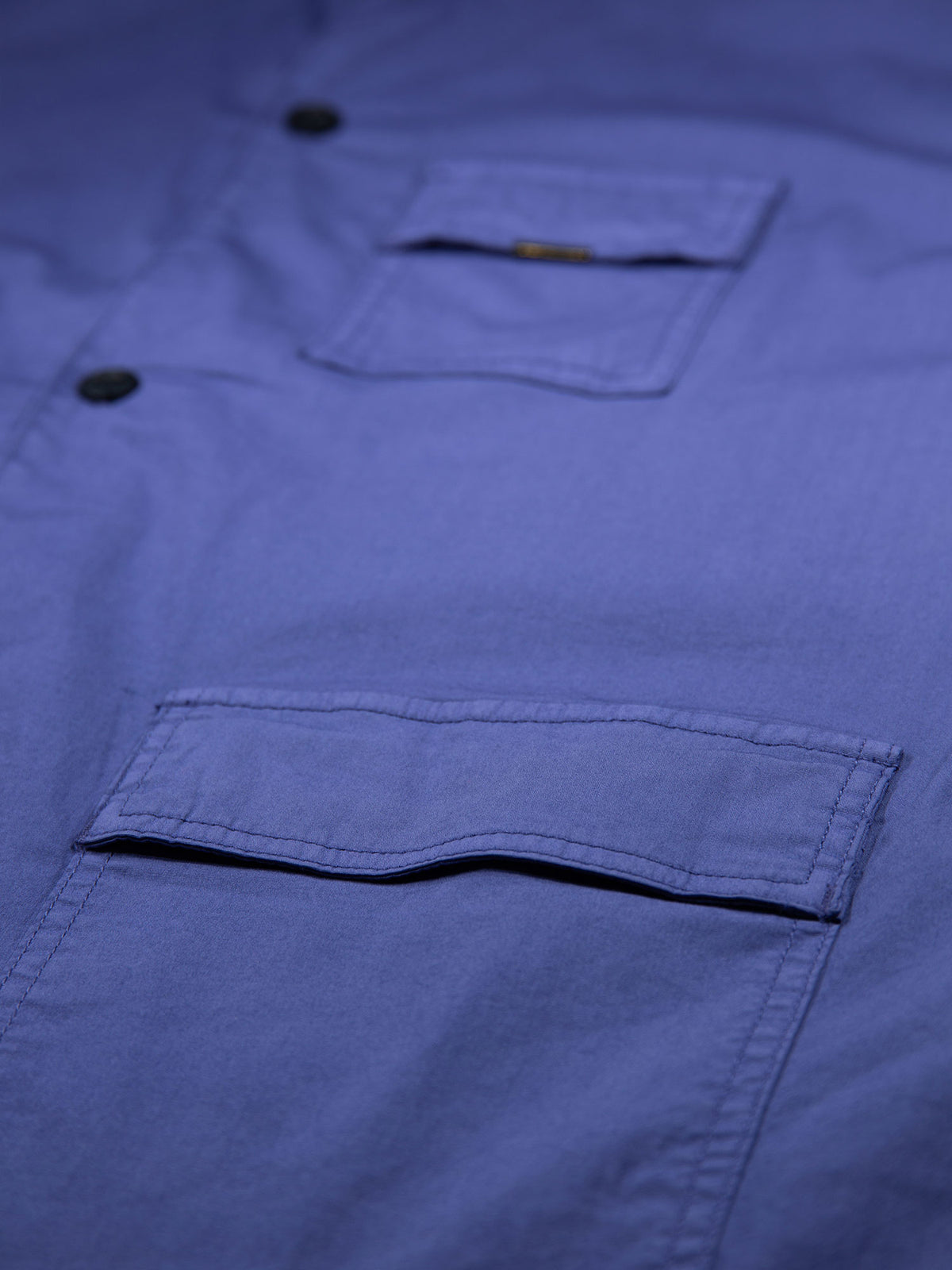 Men's purple shirt with button-up front.