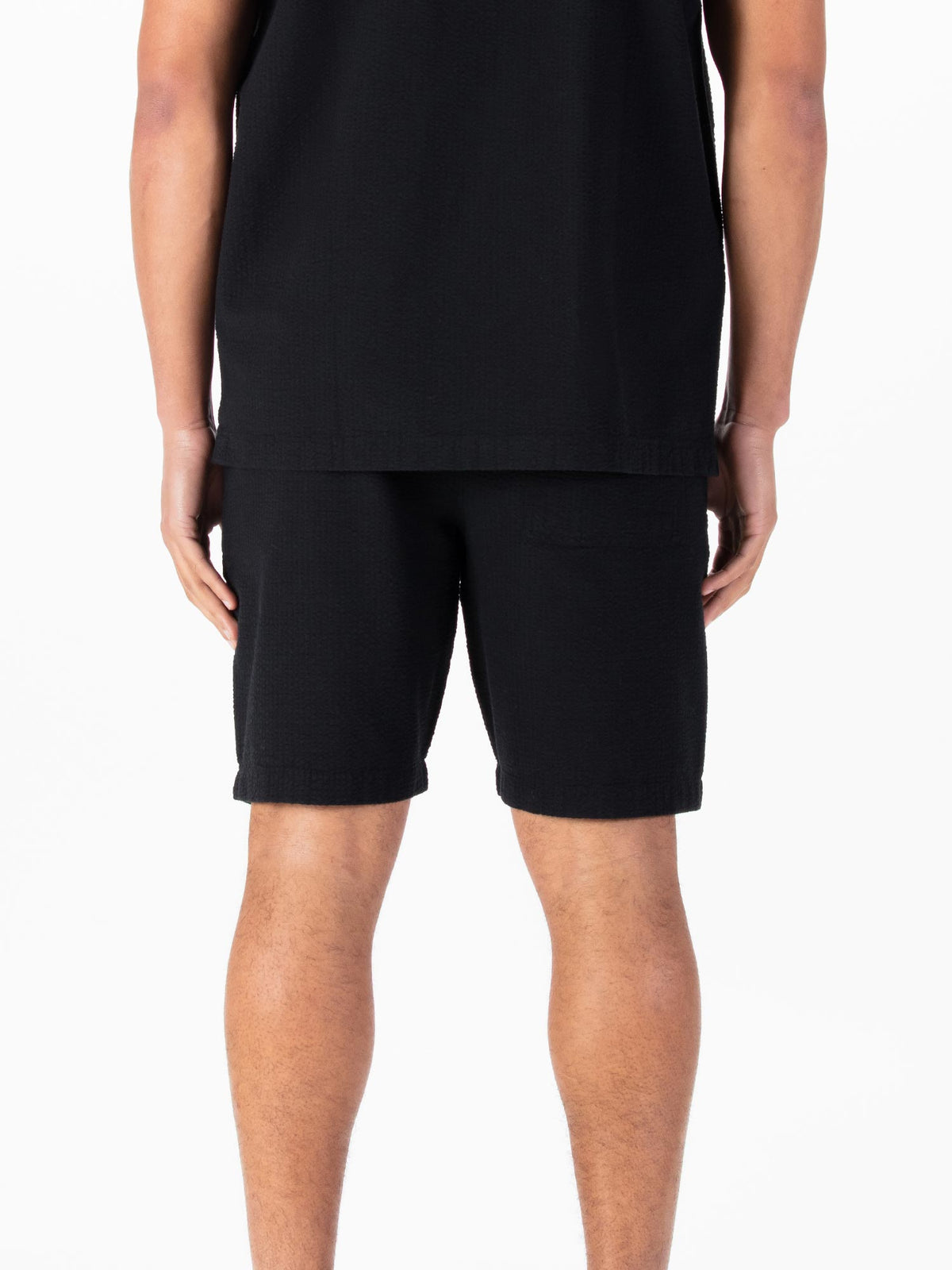 Men's black shorts with drawstring waistband.