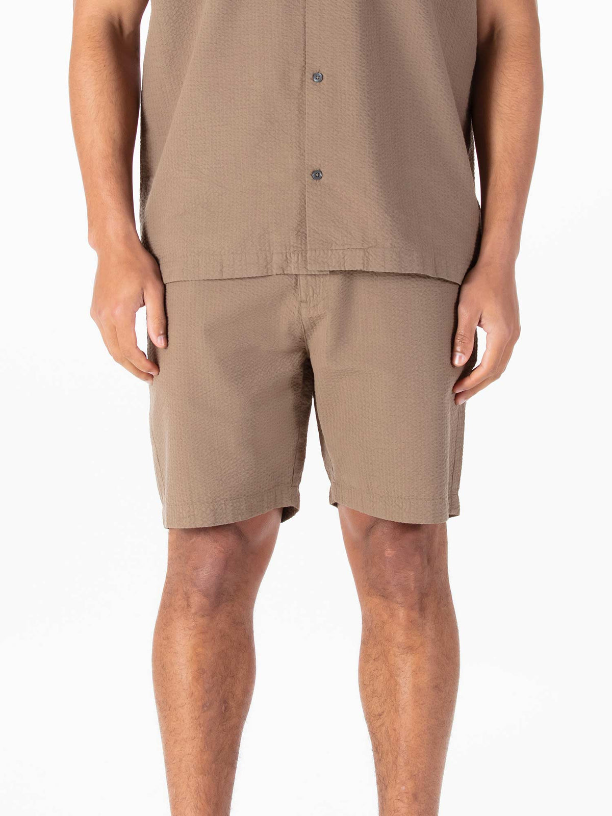Men's brown shorts with drawstring waistband.