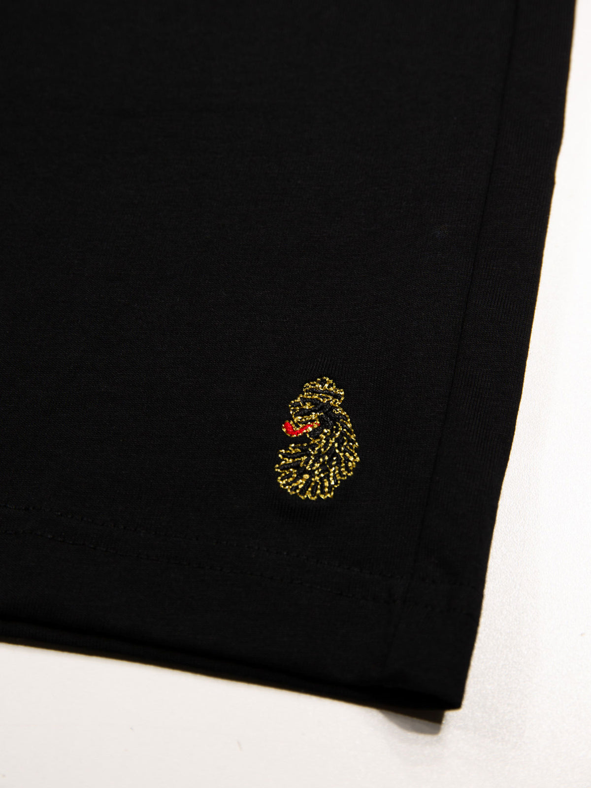 Men's black shorts with drawstring waistband, detail view 3