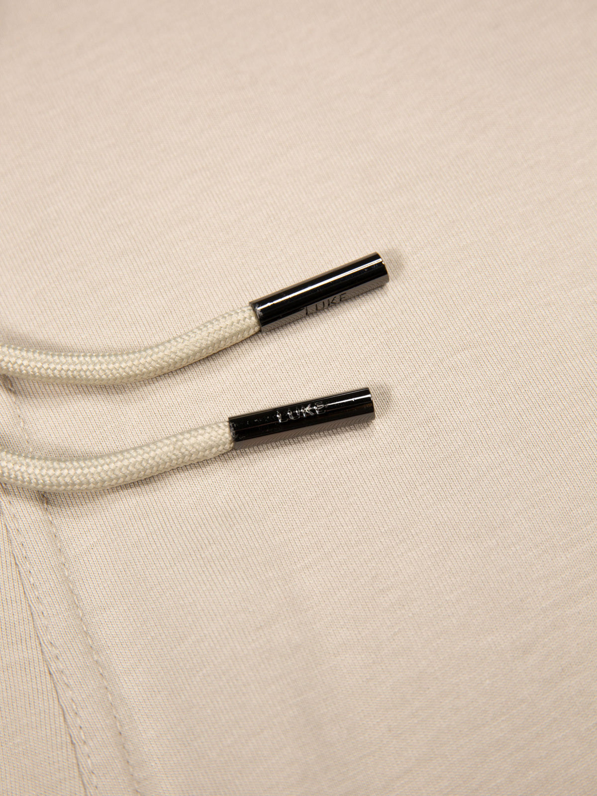 Men's beige shorts with drawstring waistband, detail view 2