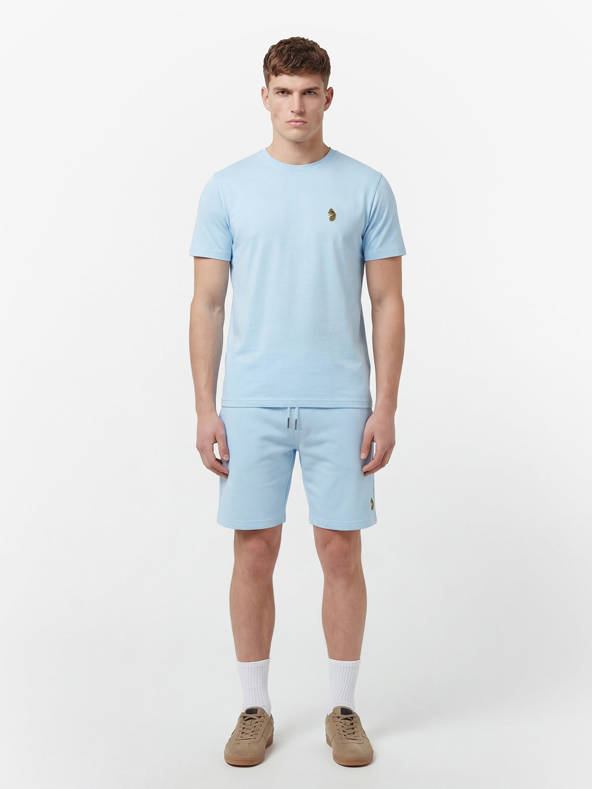 Men's blue-1 short set with short-sleeve shirt and drawstring shorts, worn by model.