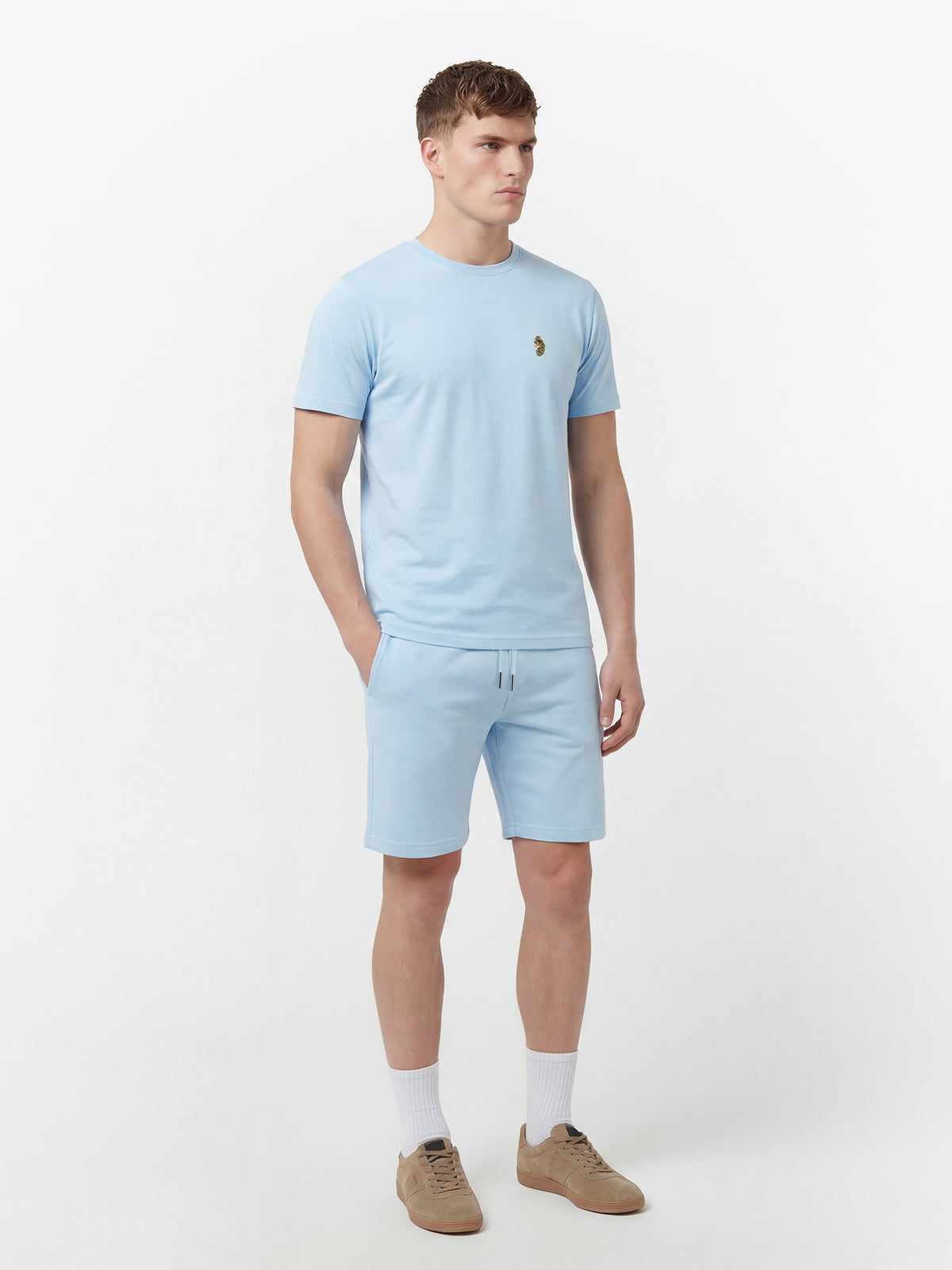 Men's blue-1 short set with short-sleeve shirt and drawstring shorts, worn by a model, front view.