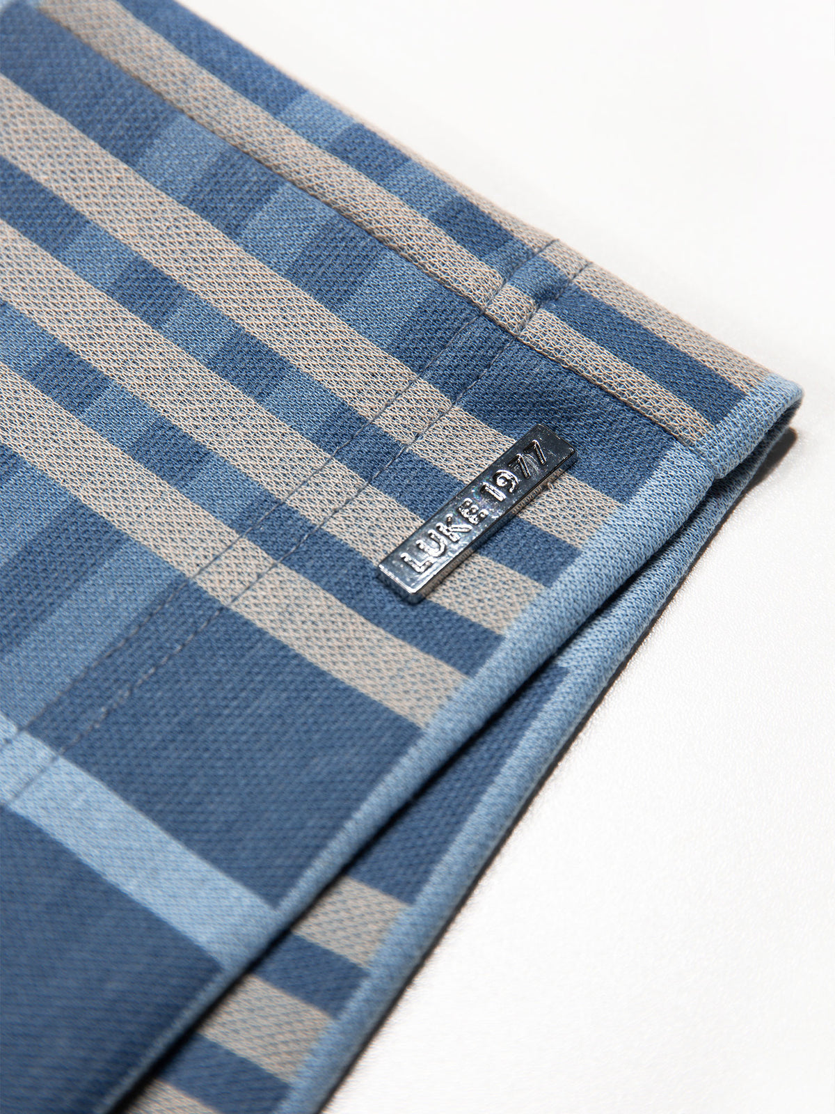 Men's blue shorts with drawstring waistband.