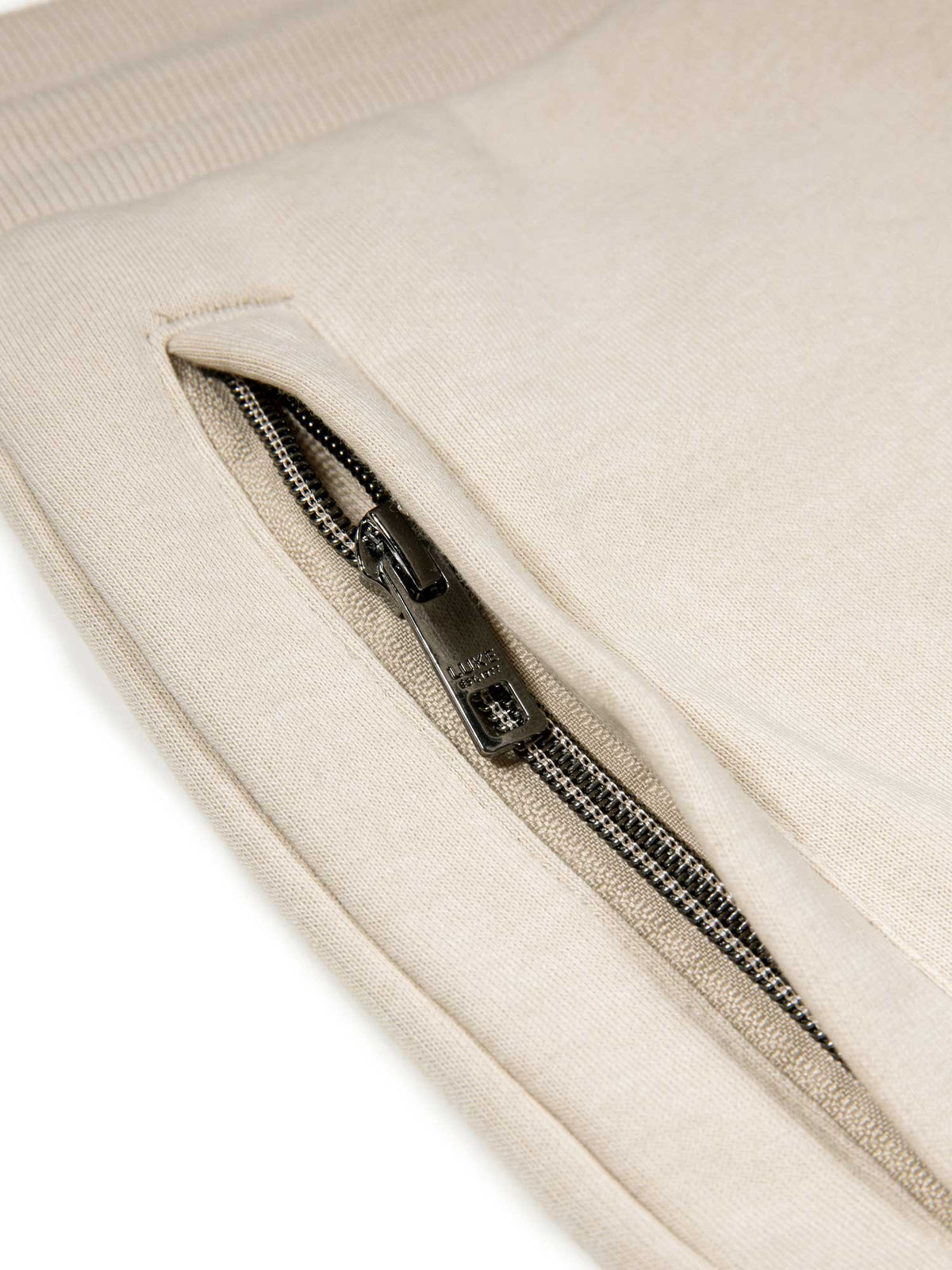 Men's beige shorts with elasticated waistband and cargo pockets.