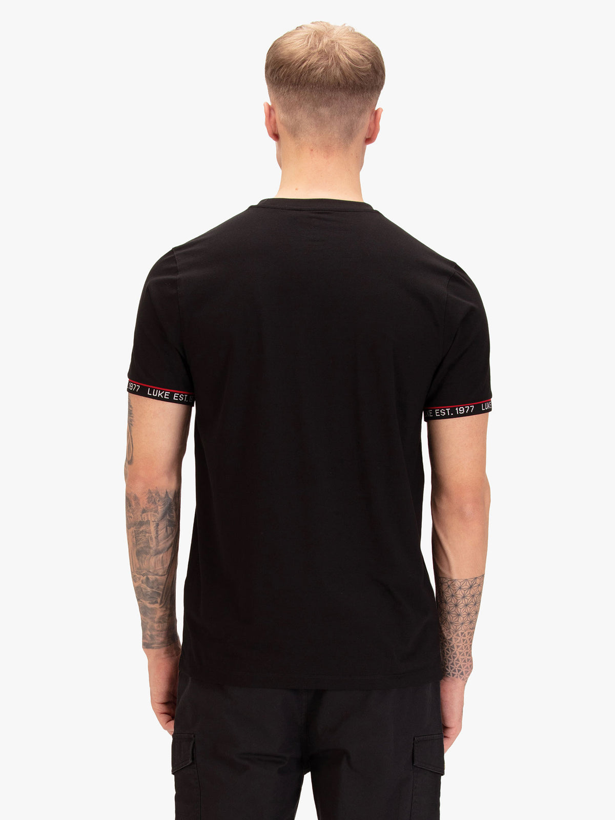 Men's black t-shirt with crew neck and short sleeves, worn by a model, back view