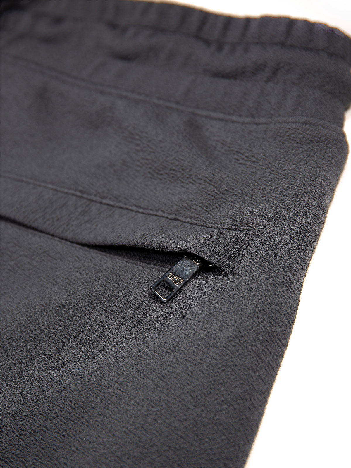 Men's grey shorts with drawstring waistband.