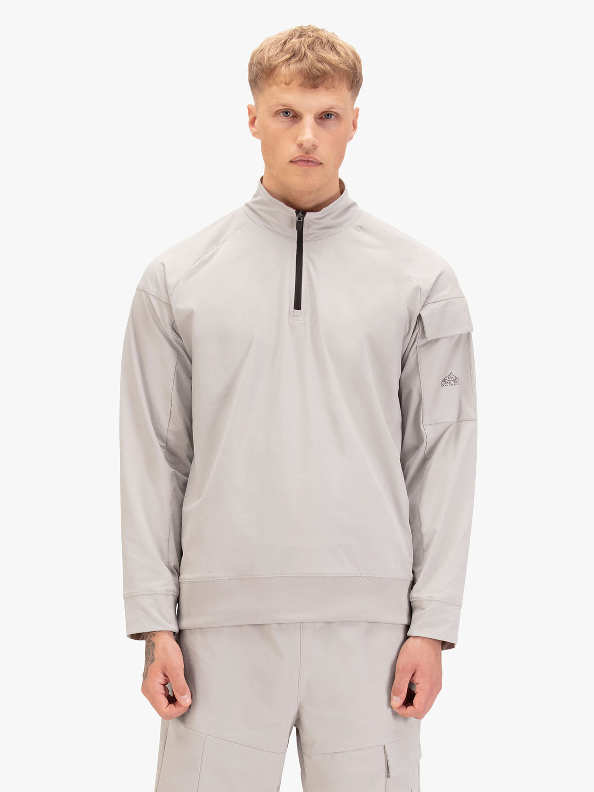 Men's grey sweatshirt with quarter-zip neck, front view