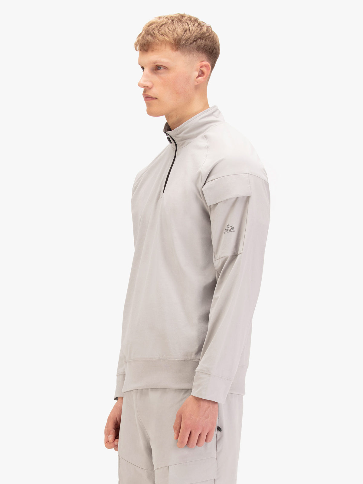 Men's grey sweatshirt with quarter-zip neck, back view