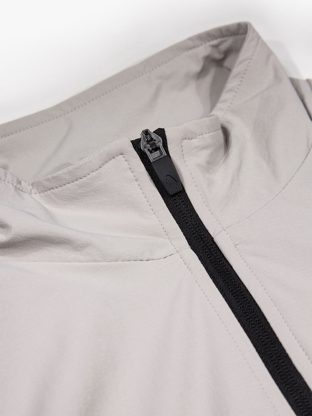 Men's grey sweatshirt with quarter-zip neck.