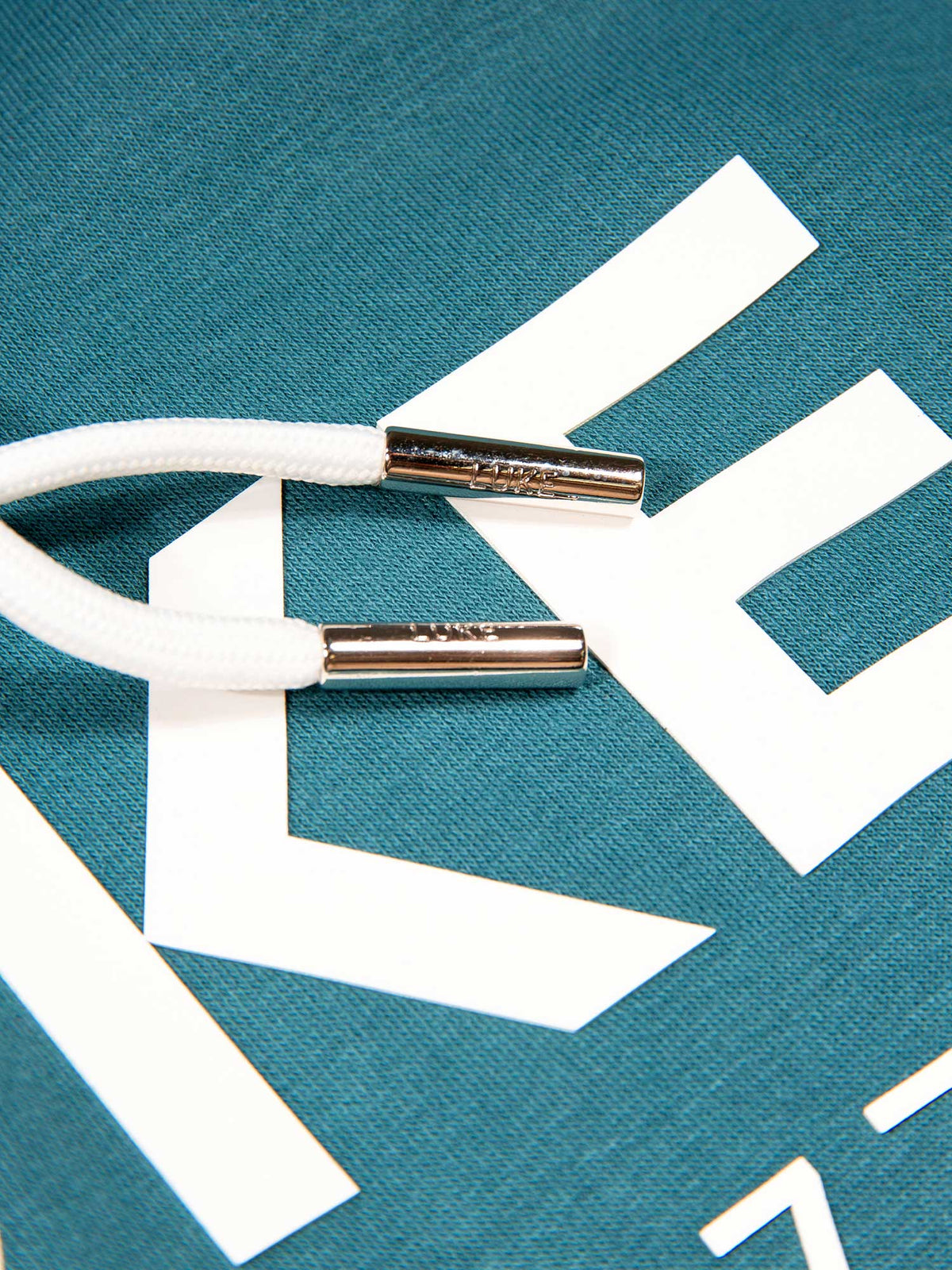 Men's relaxed-fit blue hoodie with front pocket and drawstring hood, detail view 3