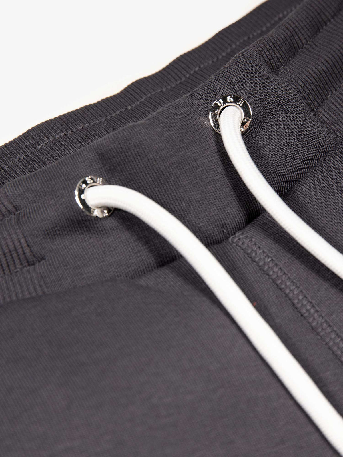 Men's grey shorts with drawstring waistband, detail view 1