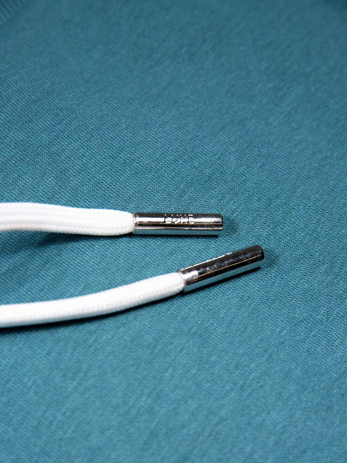 Men's blue shorts with drawstring waistband, detail view 2