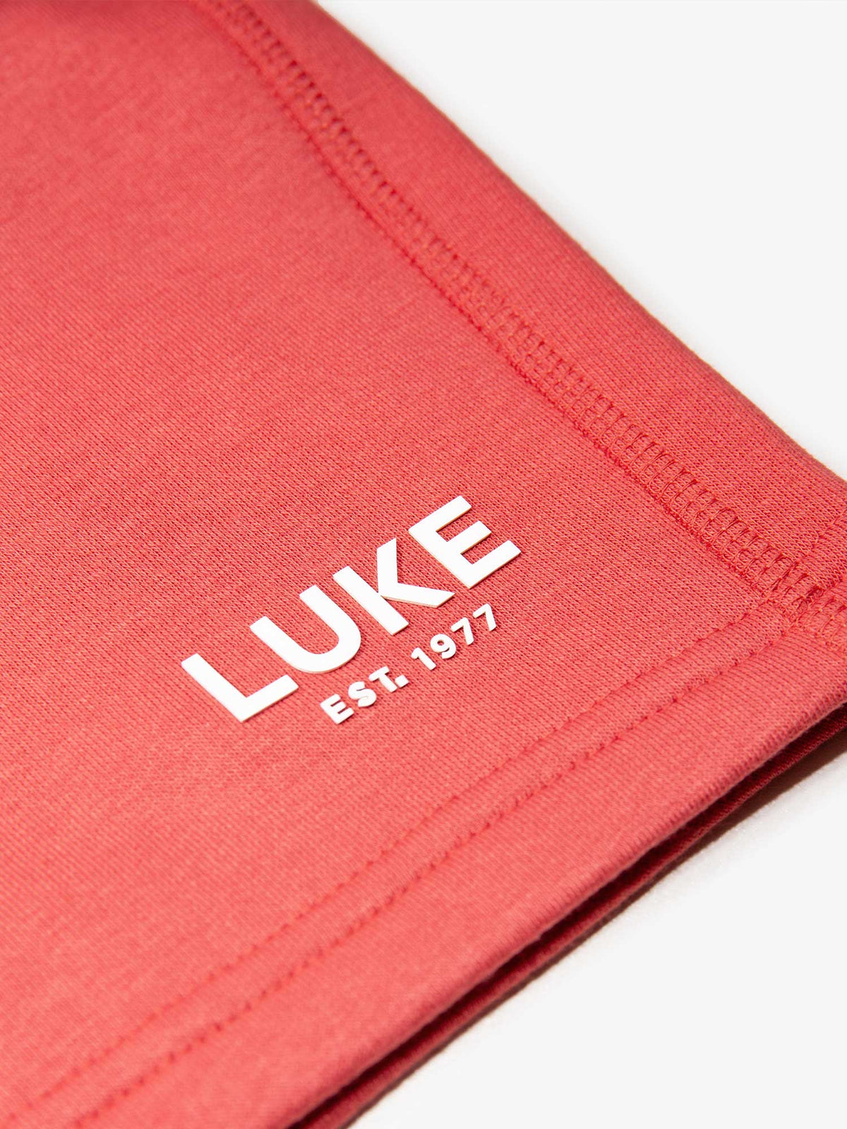 Men's red shorts with drawstring waistband, detail view 3