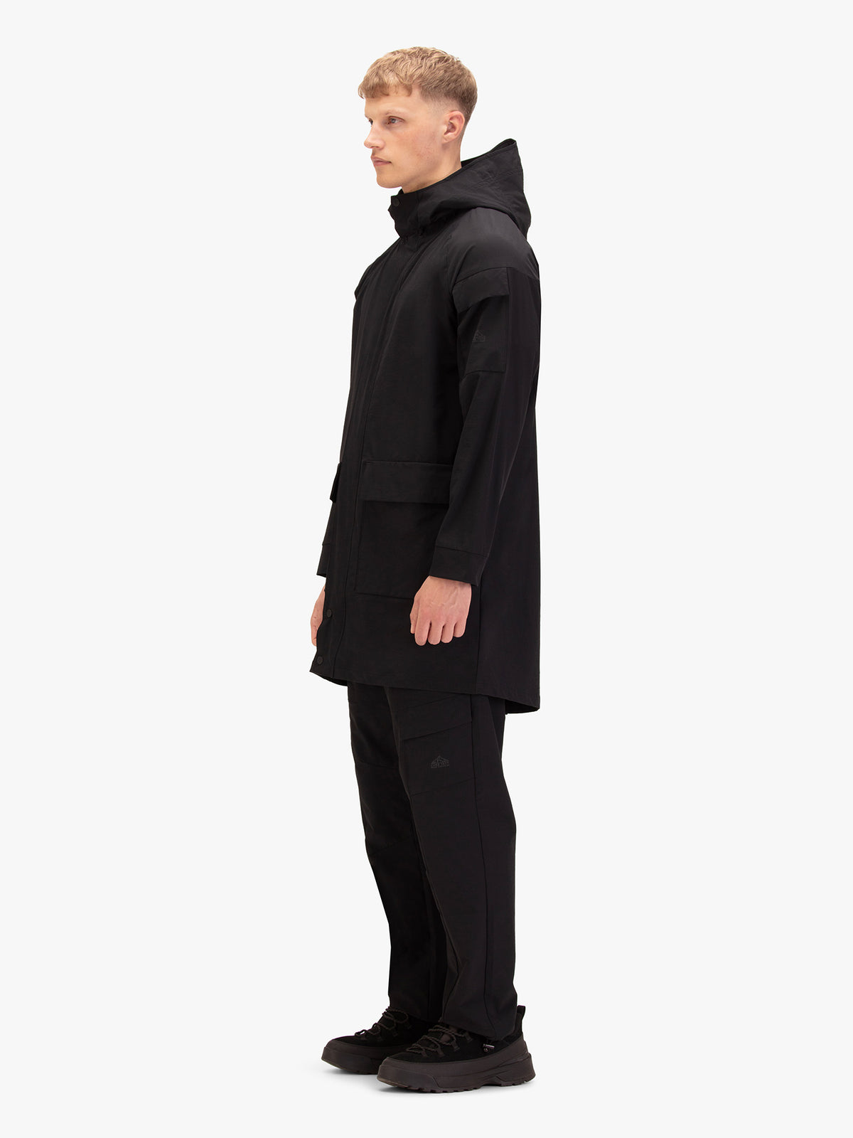 Men's black jacket with zip-up front.