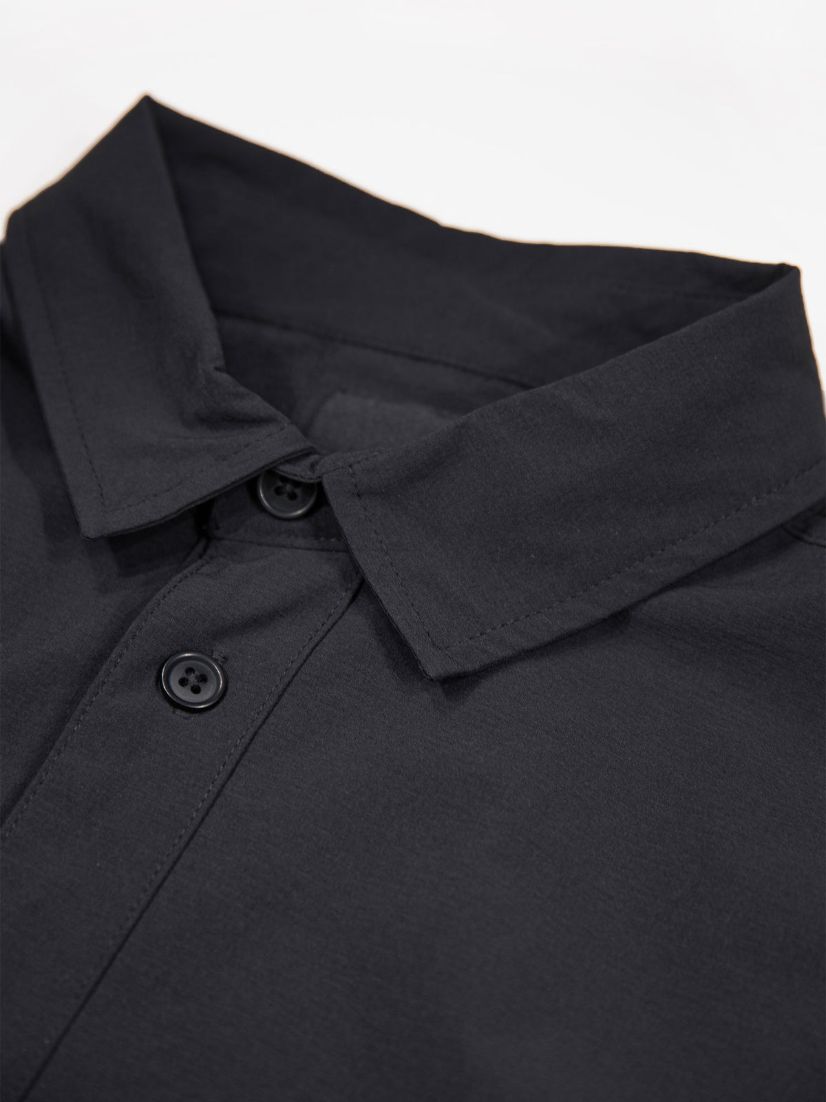 Men's black shirt with button-up front.
