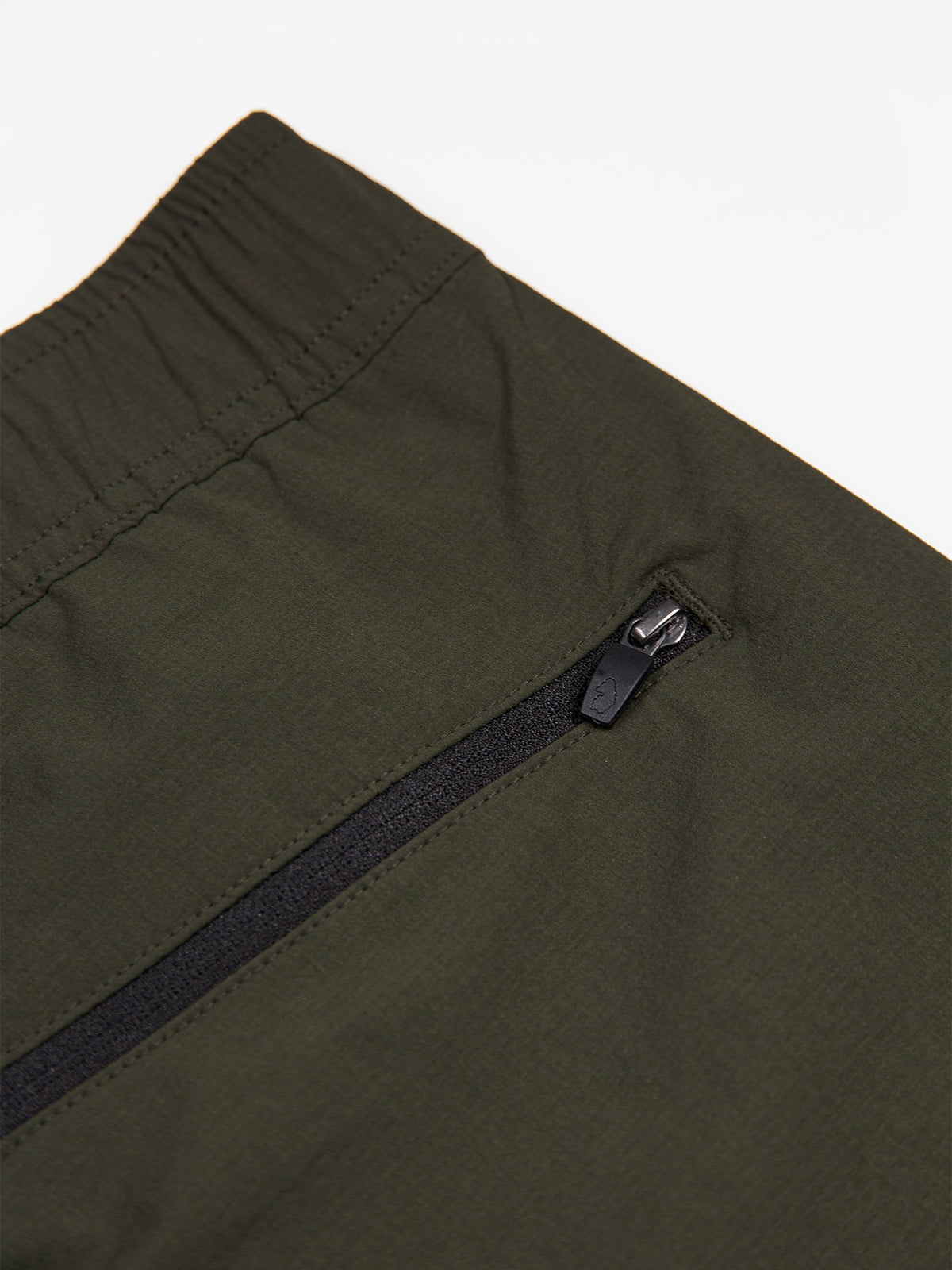 Men's green shorts with drawstring waistband.