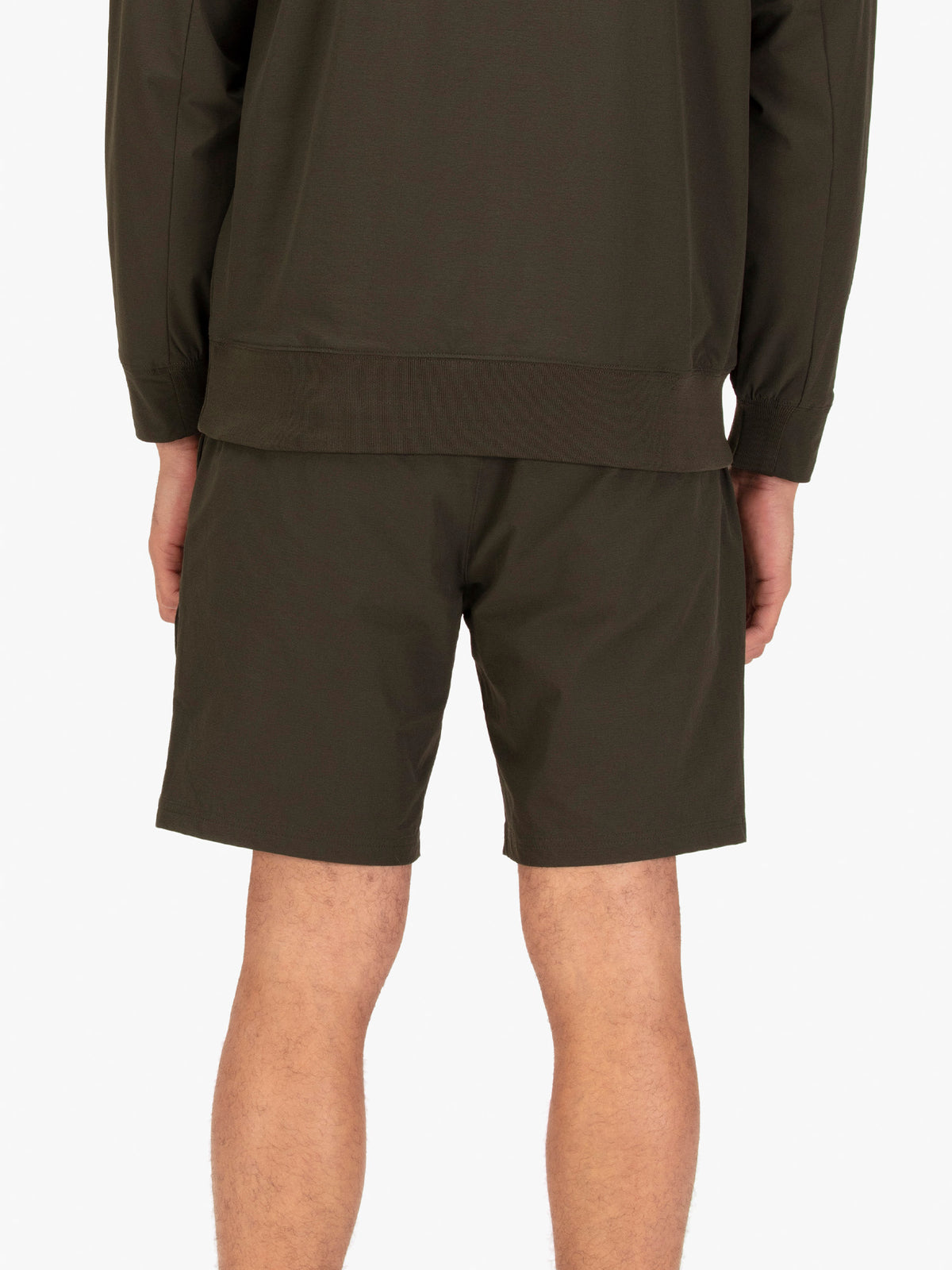 Men's green shorts with drawstring waistband.