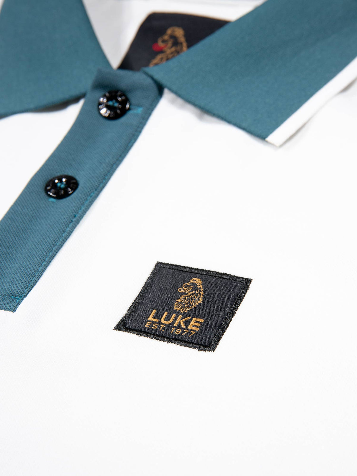 Men's white polo shirt with polo collar, detail view